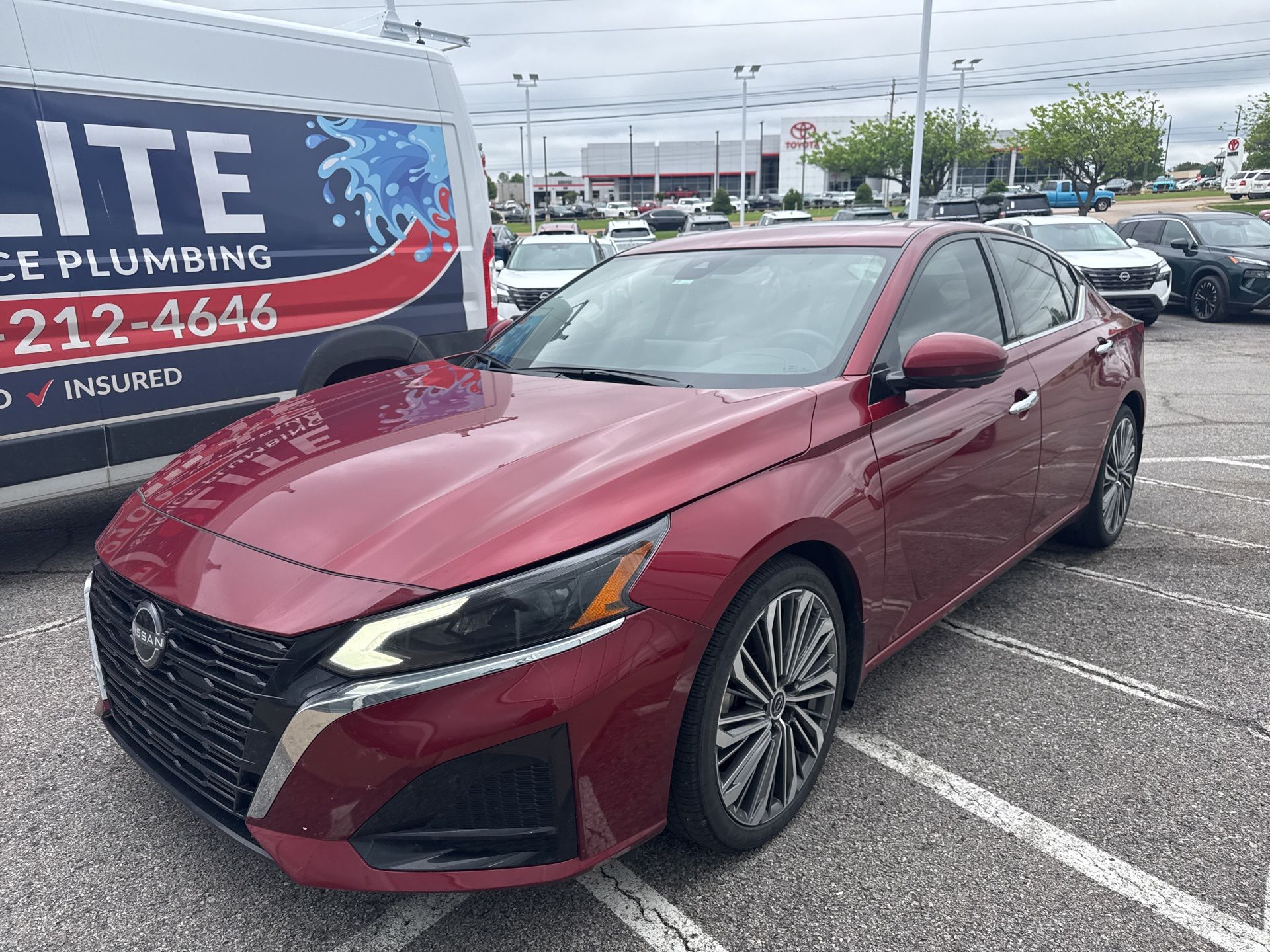 Red (Scarlet Ember Tintcoat) 2023 Nissan Altima 2.5 SL FWD Sedan Front-Wheel Drive Continuously Variable Transmission