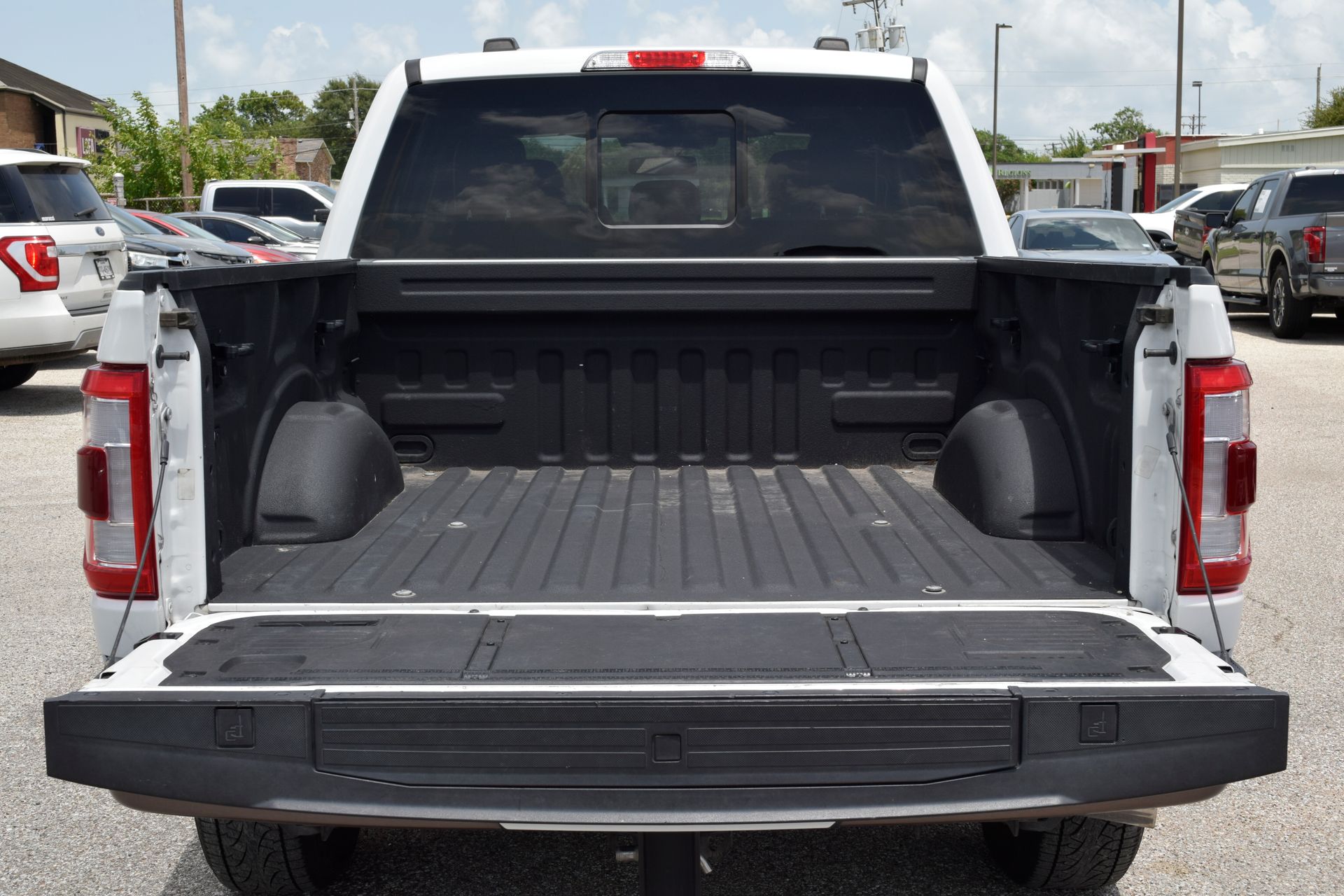 2023 Ford F-150 King Ranch White at DeMontrond Gulf Freeway