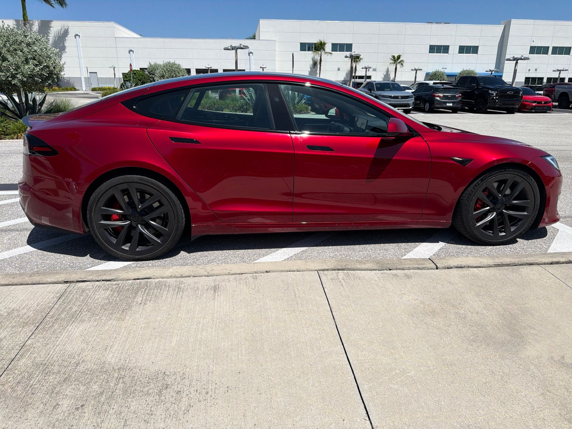 Used 2024 Ultra Red Tesla Plaid image 6