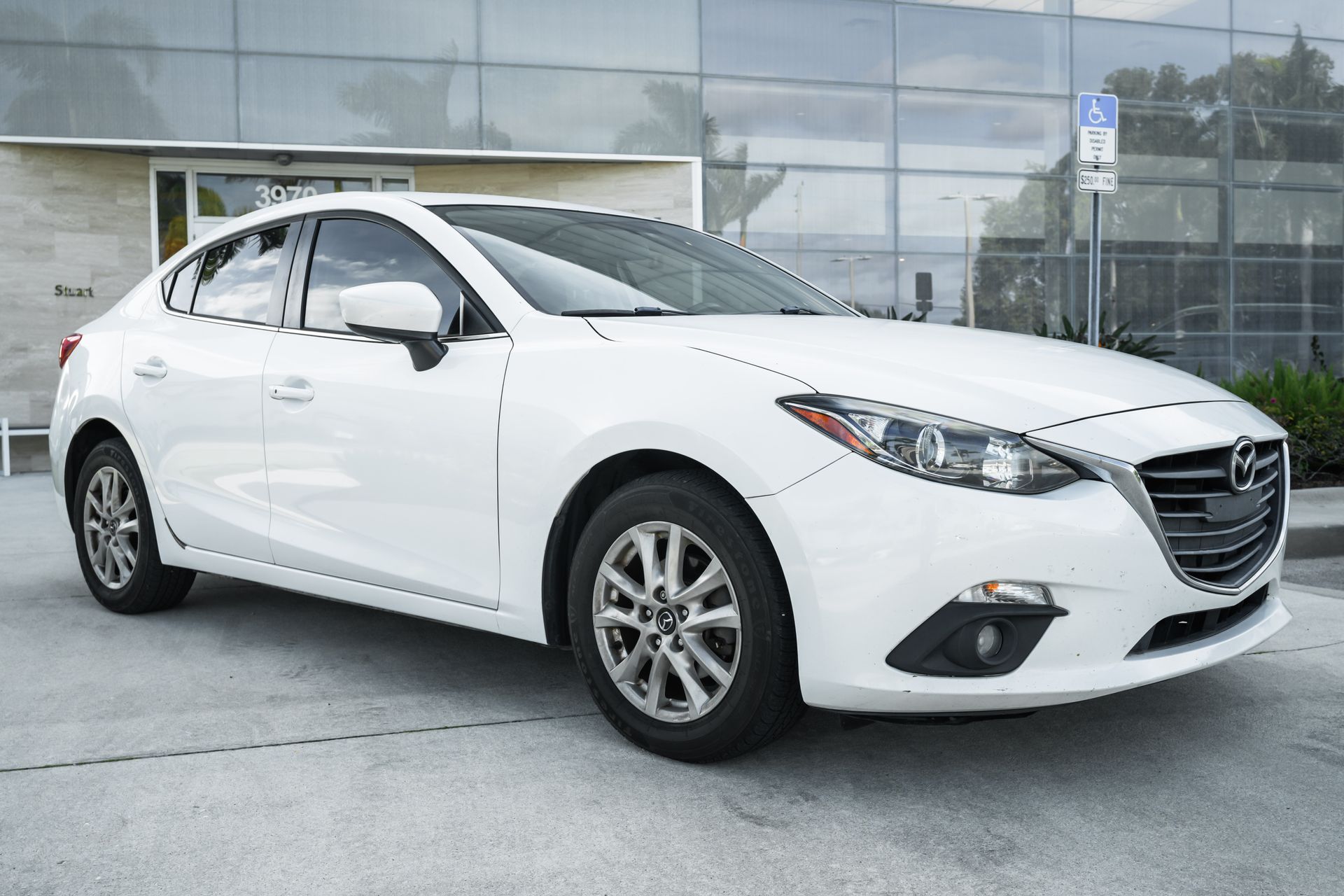 Used 2015 Mazda MAZDA3 i Touring with VIN 3MZBM1V77FM173669 for sale in Stuart, FL