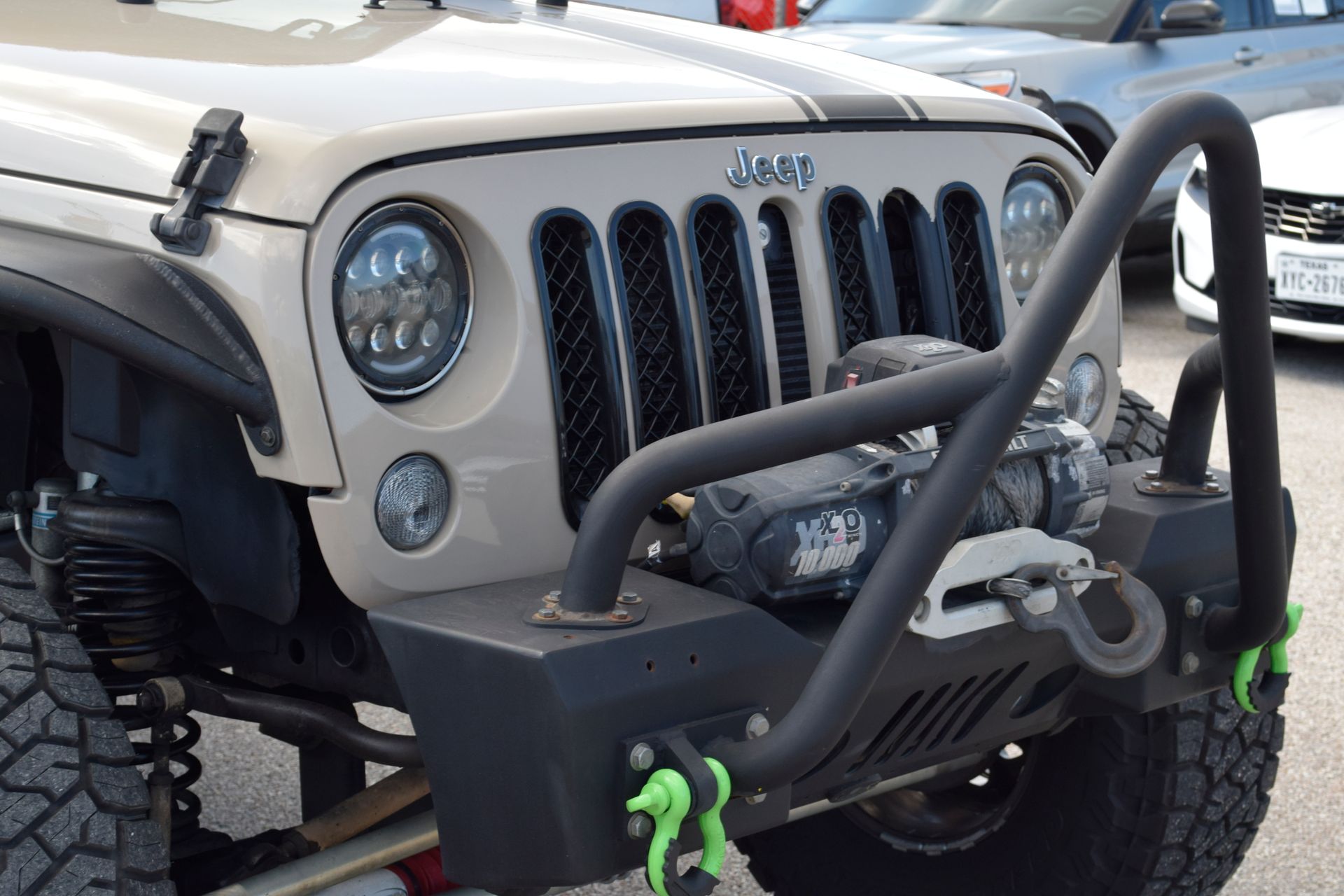 2016 Jeep Wrangler Unlimited Sport Beige at DeMontrond Automotive Group