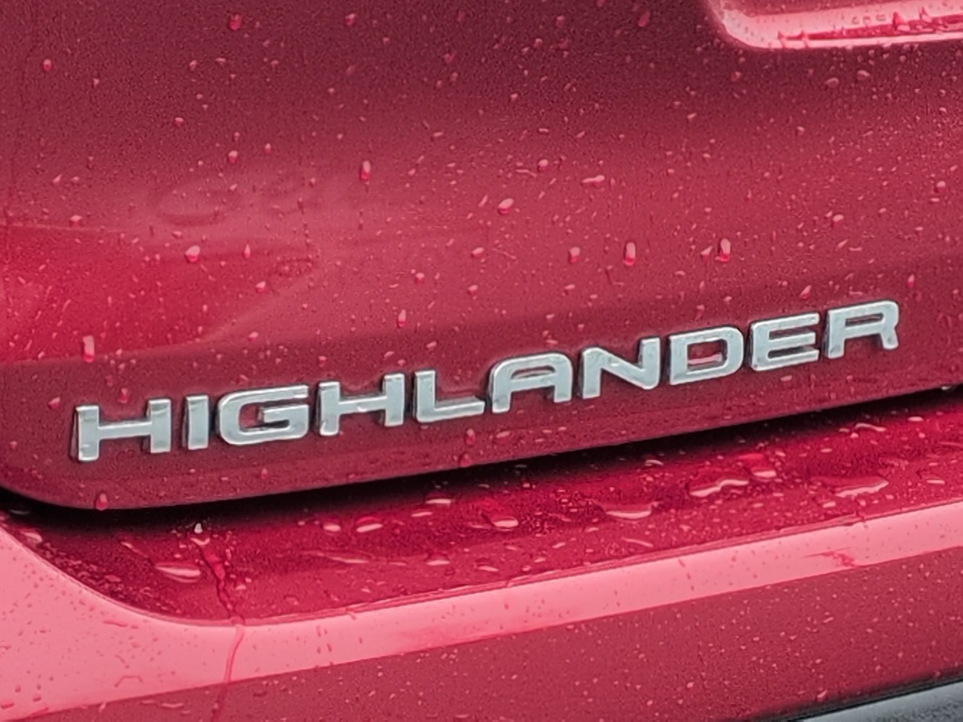 used 2022 Toyota Highlander Hybrid car, priced at $27,940
