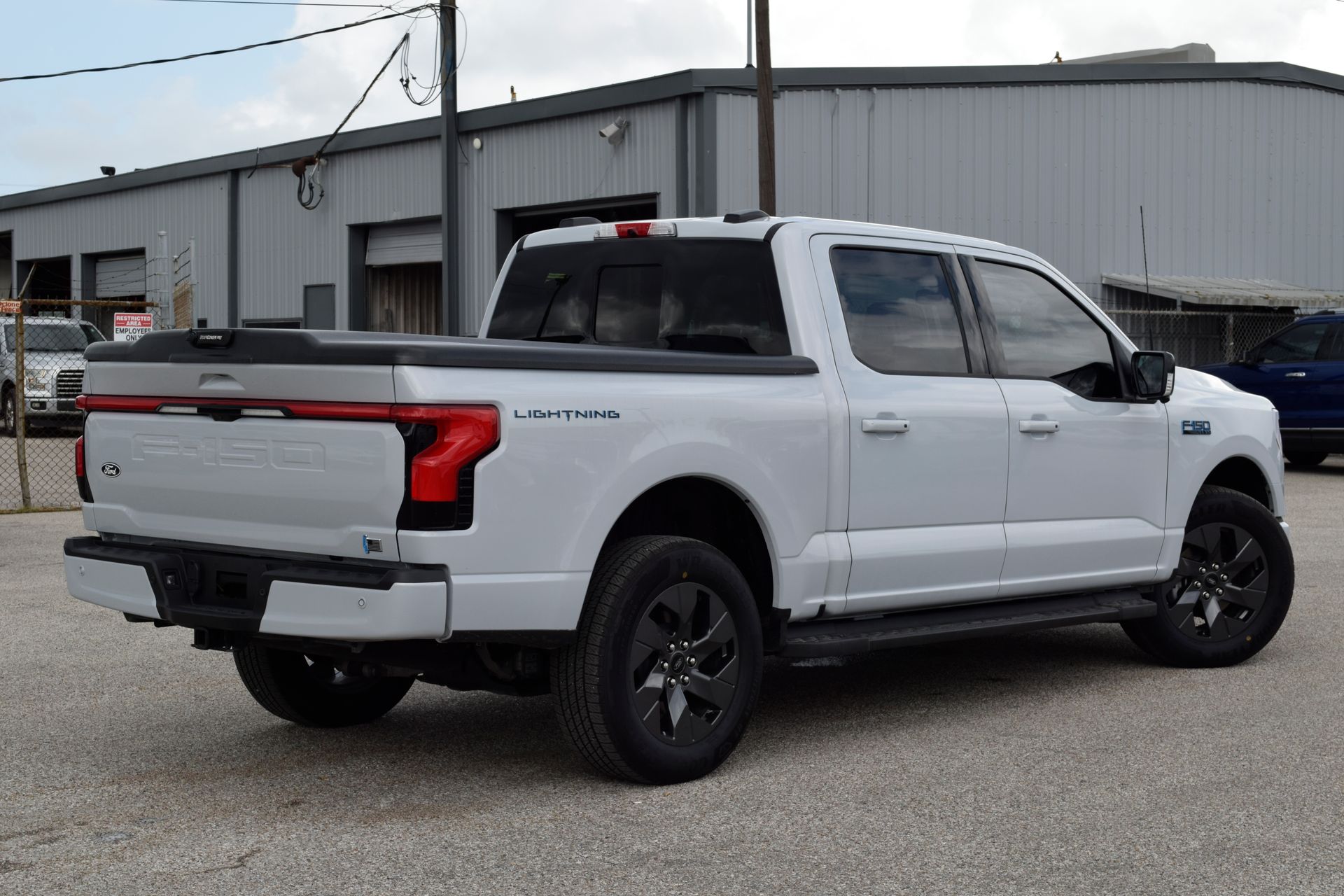 2025 Ford F-150 Lightning Lariat White at DeMontrond Ford