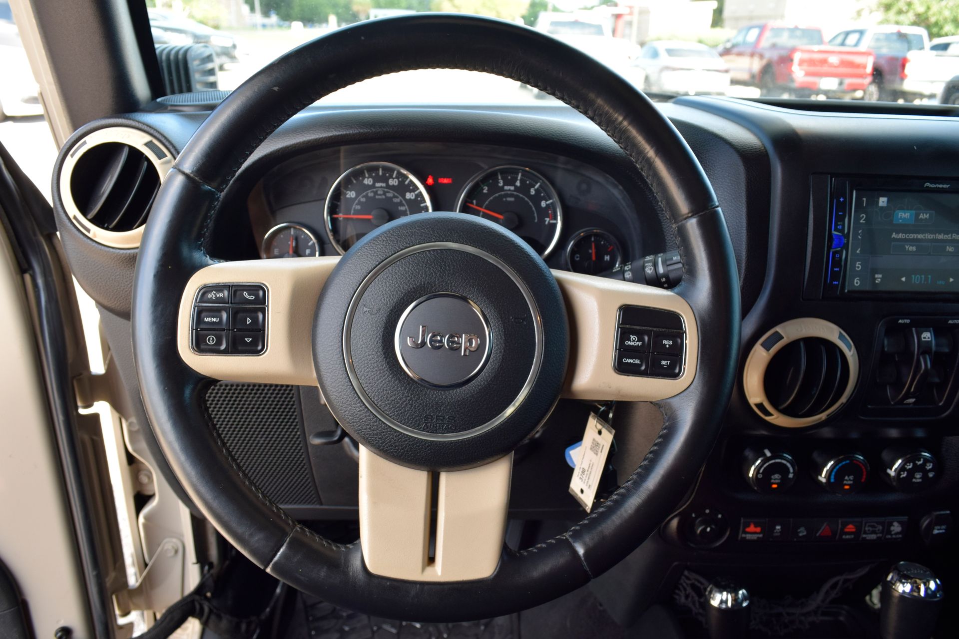 2016 Jeep Wrangler Unlimited Sport Beige at DeMontrond Automotive Group