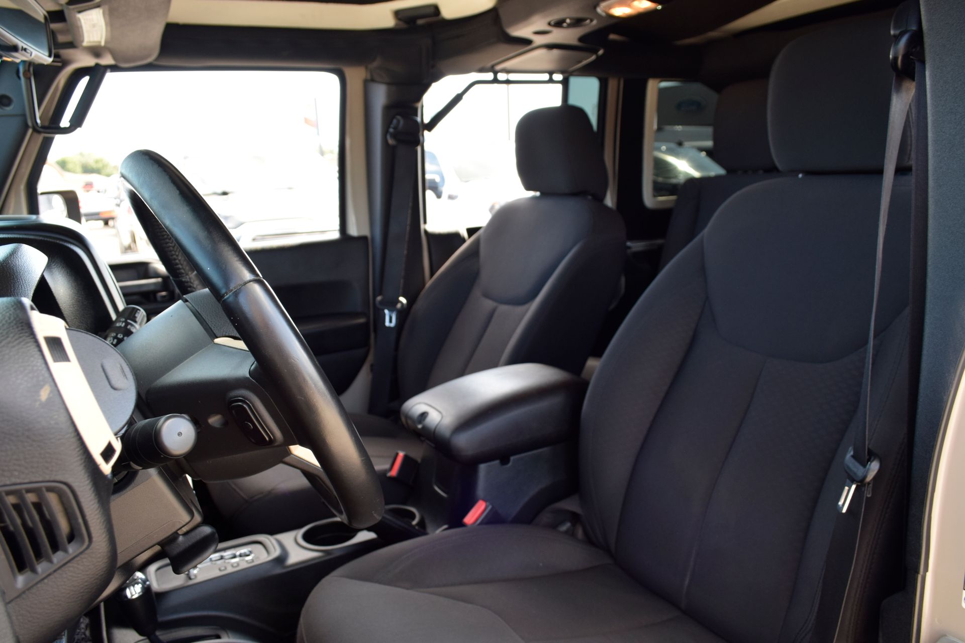 2016 Jeep Wrangler Unlimited Sport Beige at DeMontrond Automotive Group