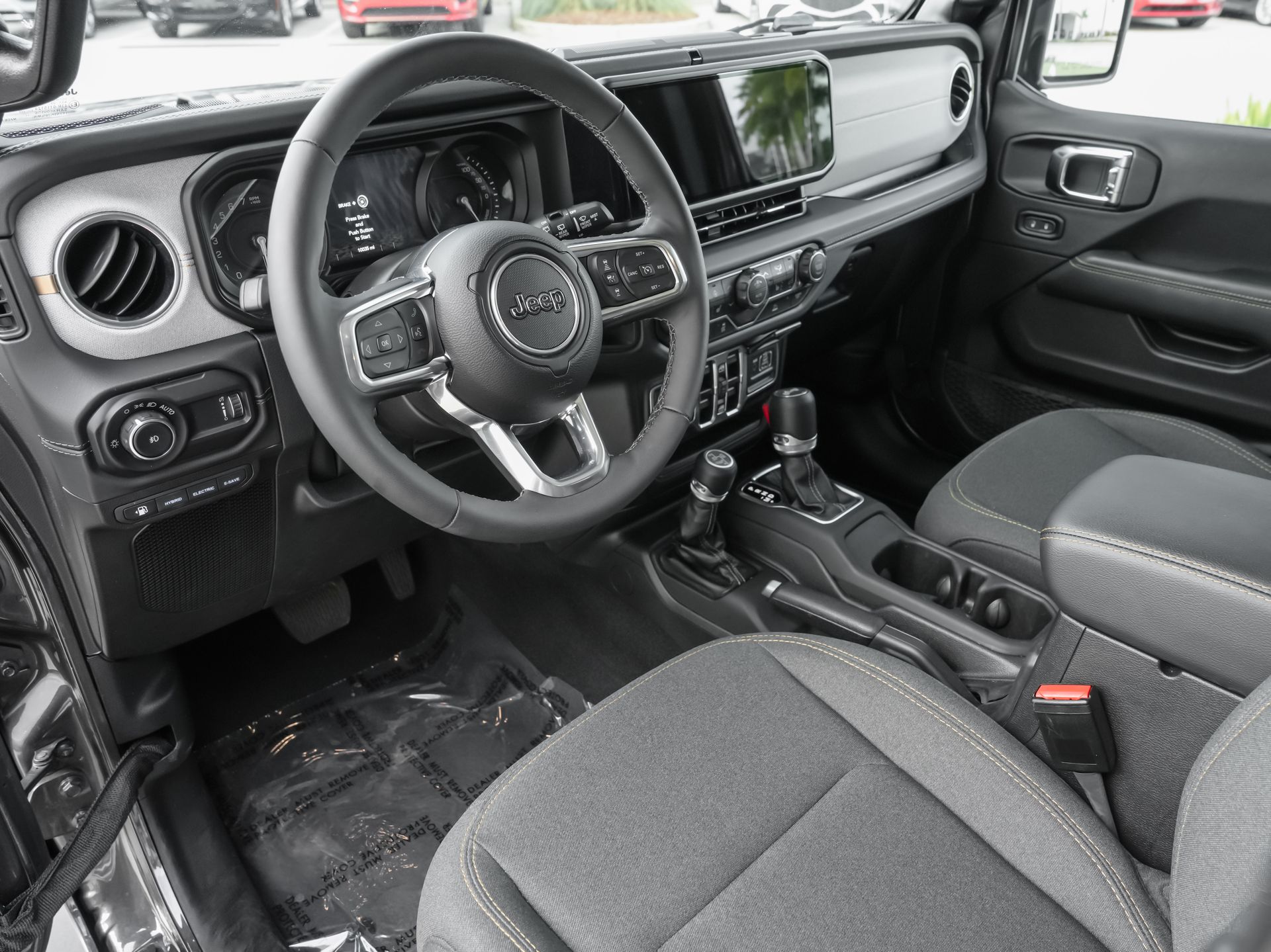 used 2025 Jeep Wrangler car, priced at $33,200