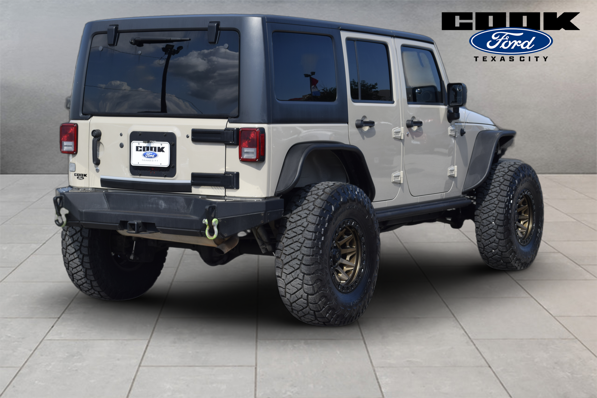2016 Jeep Wrangler Unlimited Sport Beige at DeMontrond Automotive Group