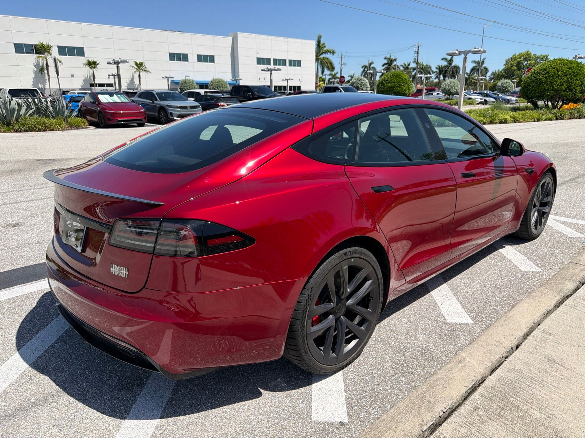 Used 2024 Ultra Red Tesla Plaid image 5