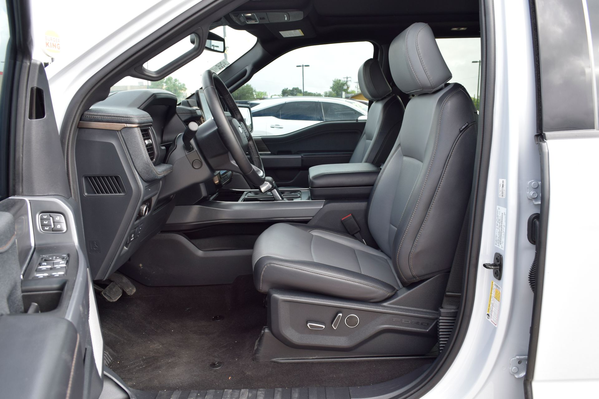2025 Ford F-150 Lightning Lariat White at DeMontrond Ford