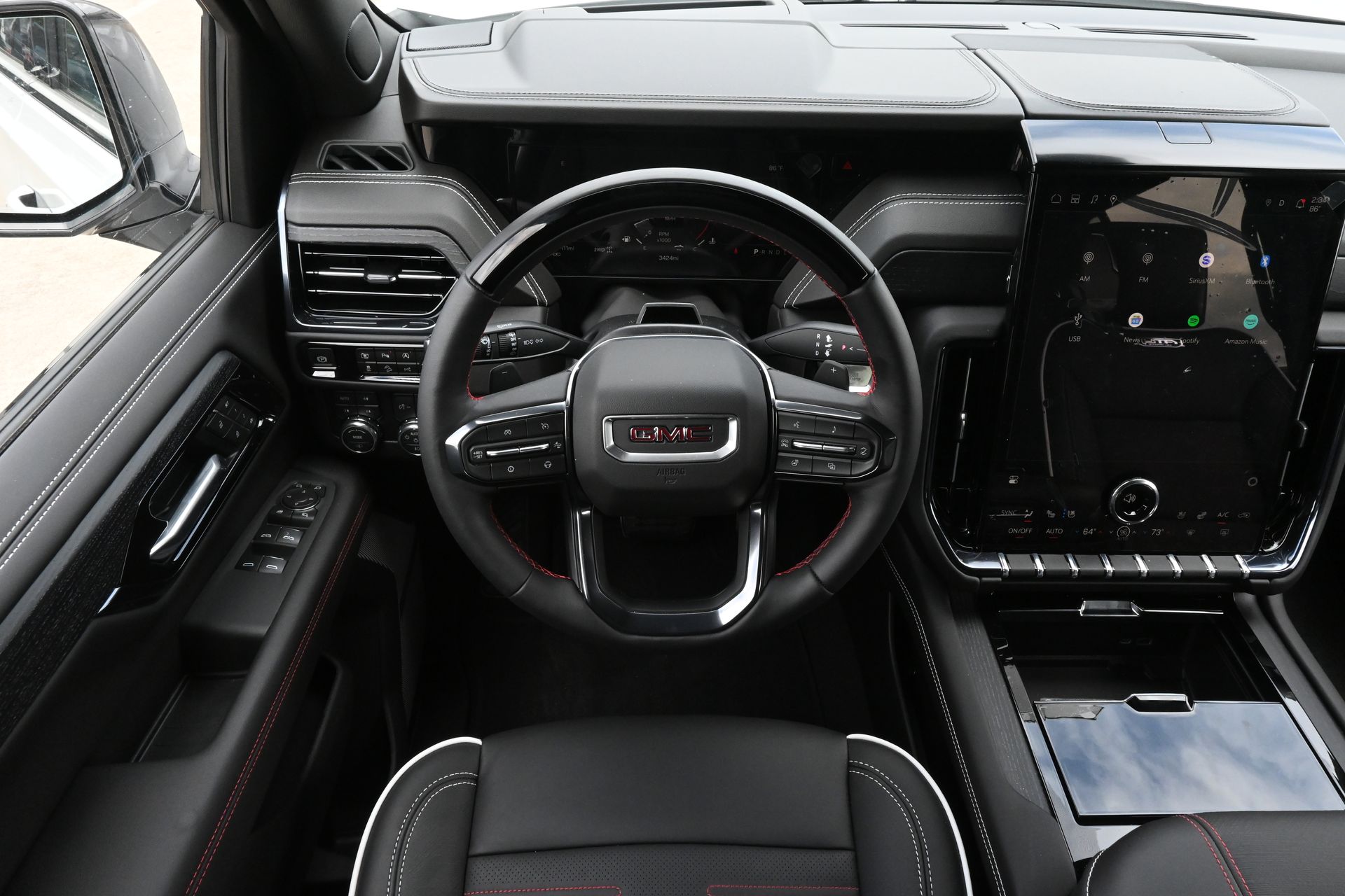 2026 GMC Yukon AT4 Ultimate White at Central Houston Nissan