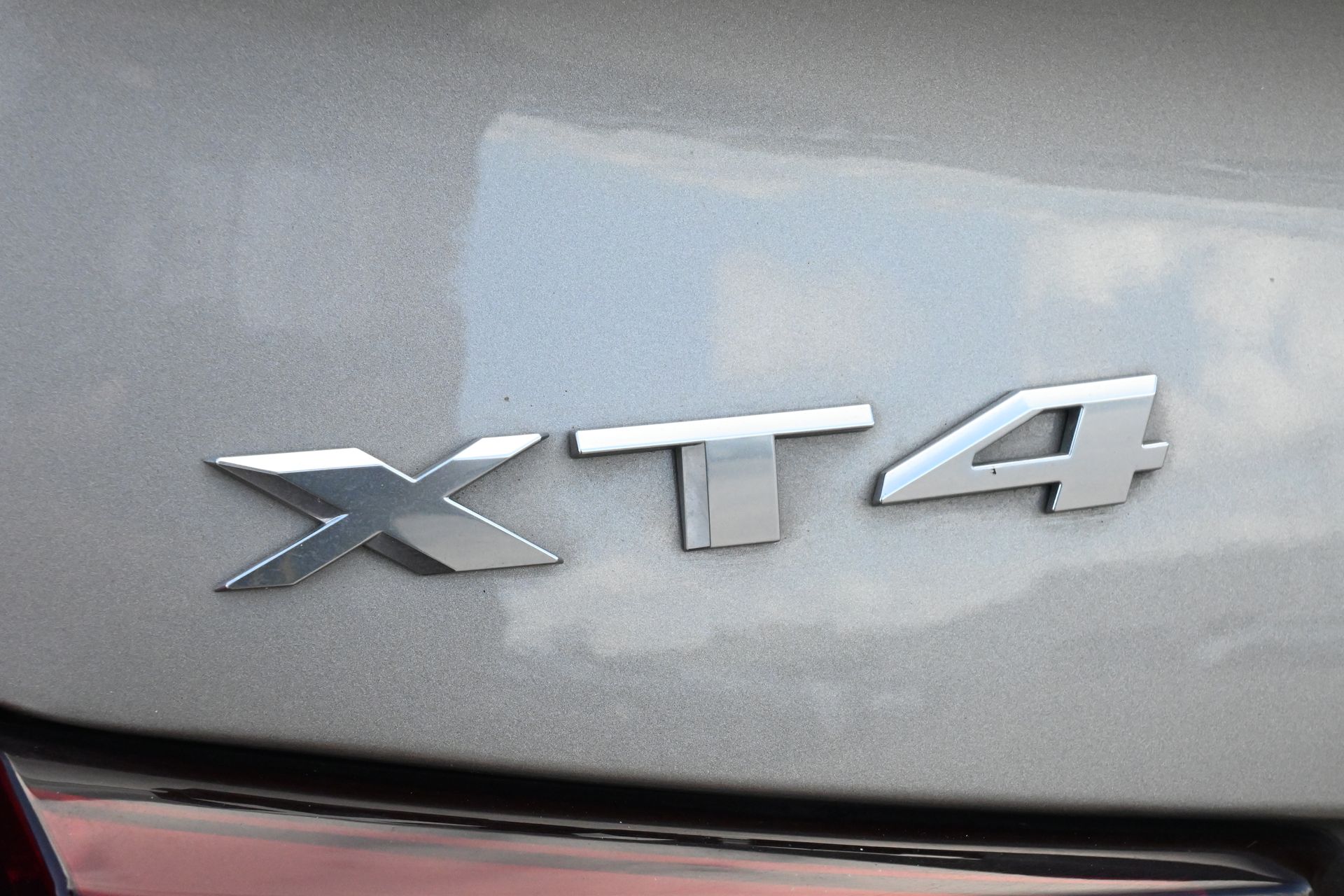2023 Cadillac XT4 Premium Luxury Brown at AutoSavvy Houston Northwest
