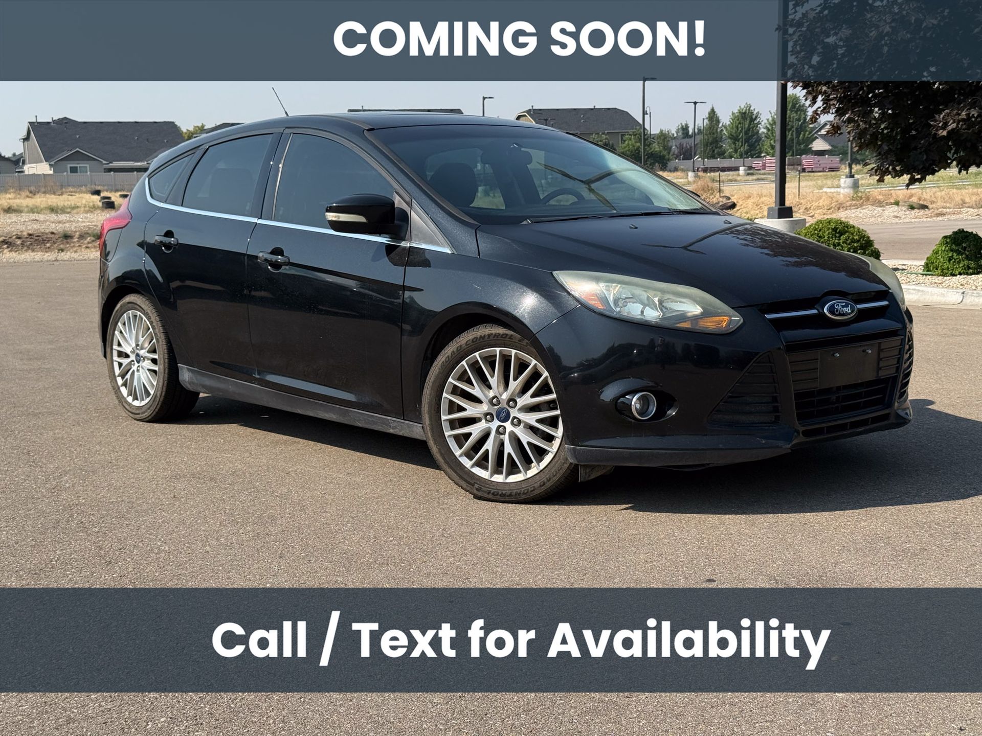 Tuxedo Black Metallic 2014 Ford Focus Hatchback Front-Wheel Drive Automatic