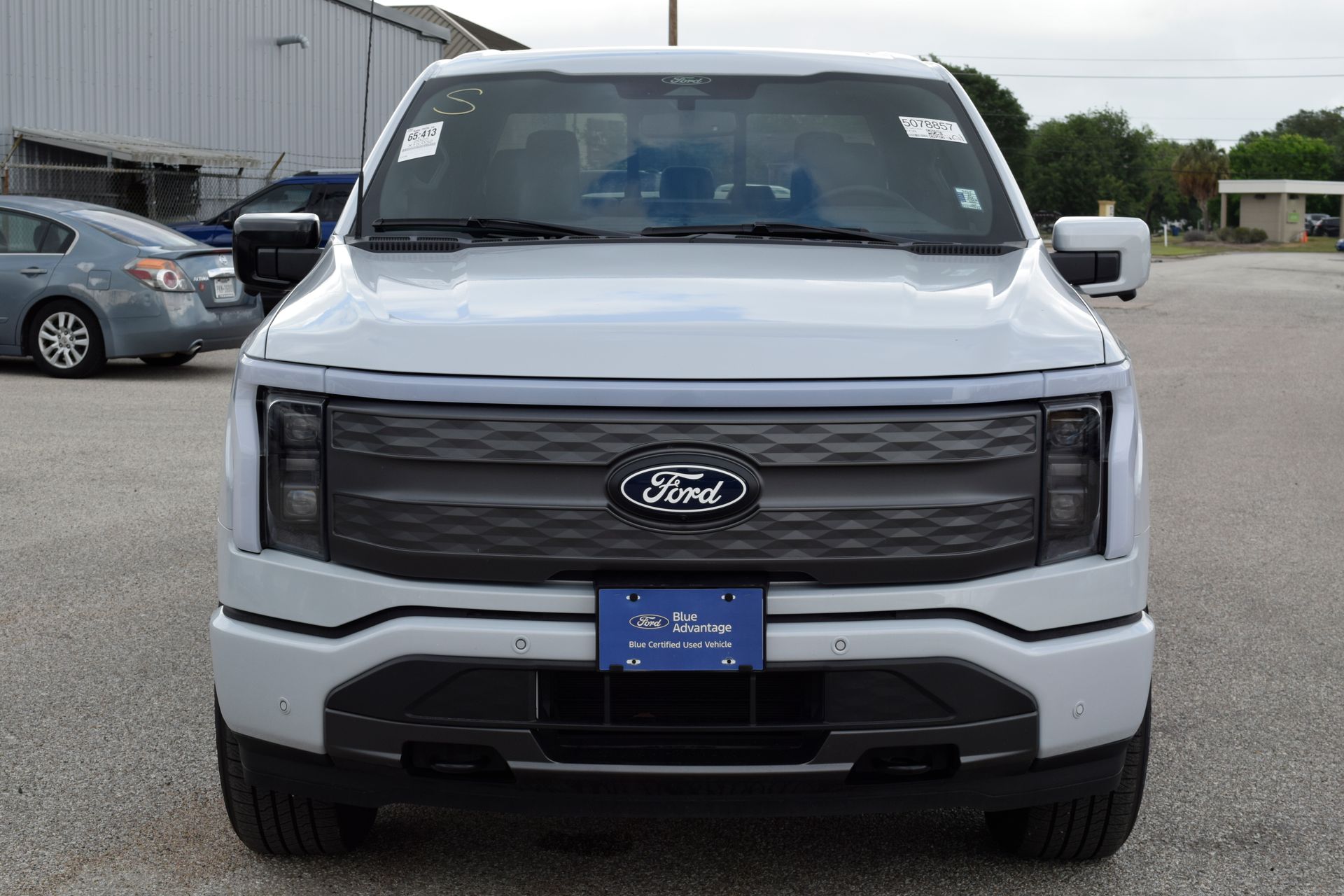 2025 Ford F-150 Lightning Lariat White at DeMontrond Ford