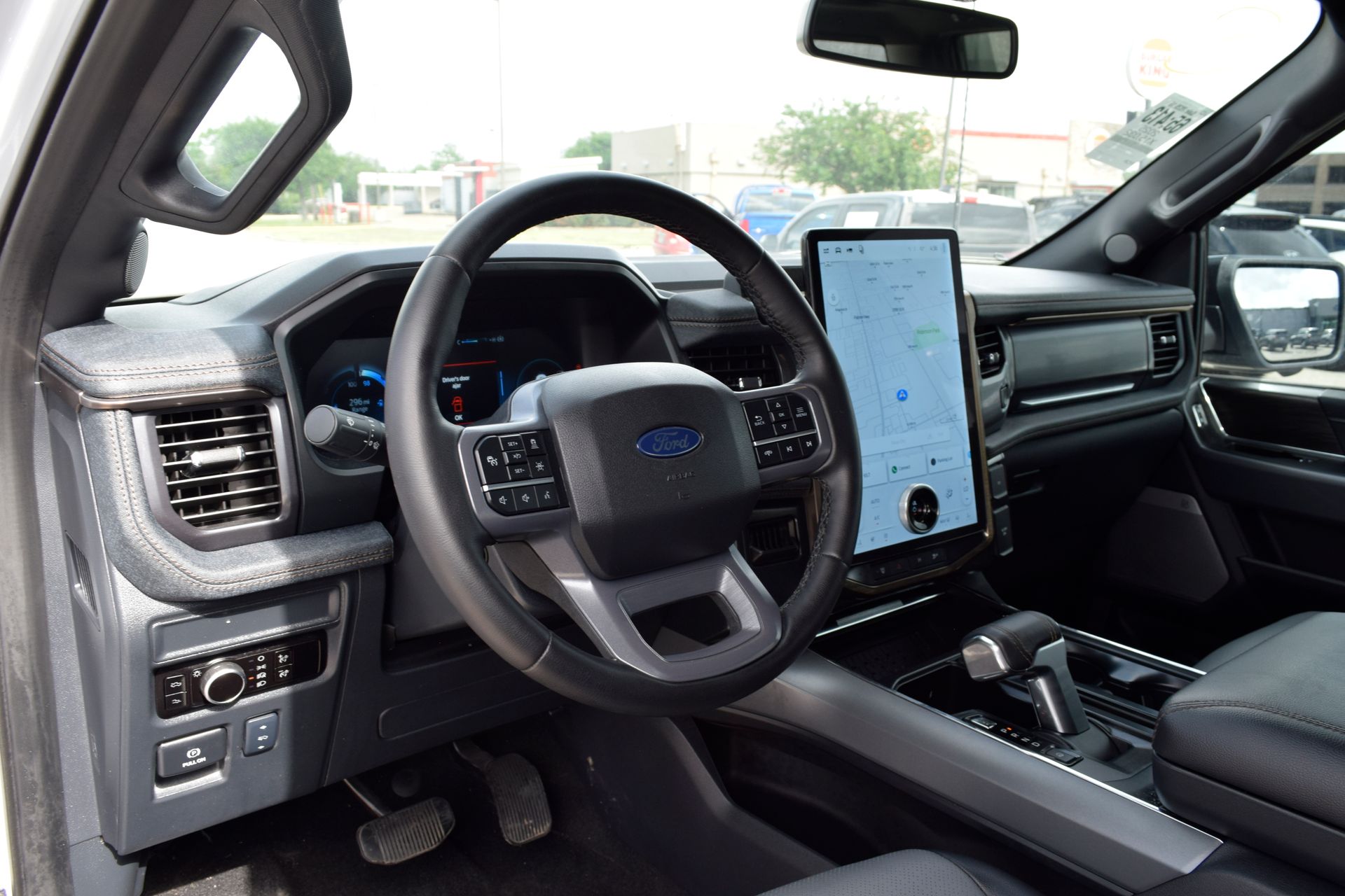 2025 Ford F-150 Lightning Lariat White at DeMontrond Ford