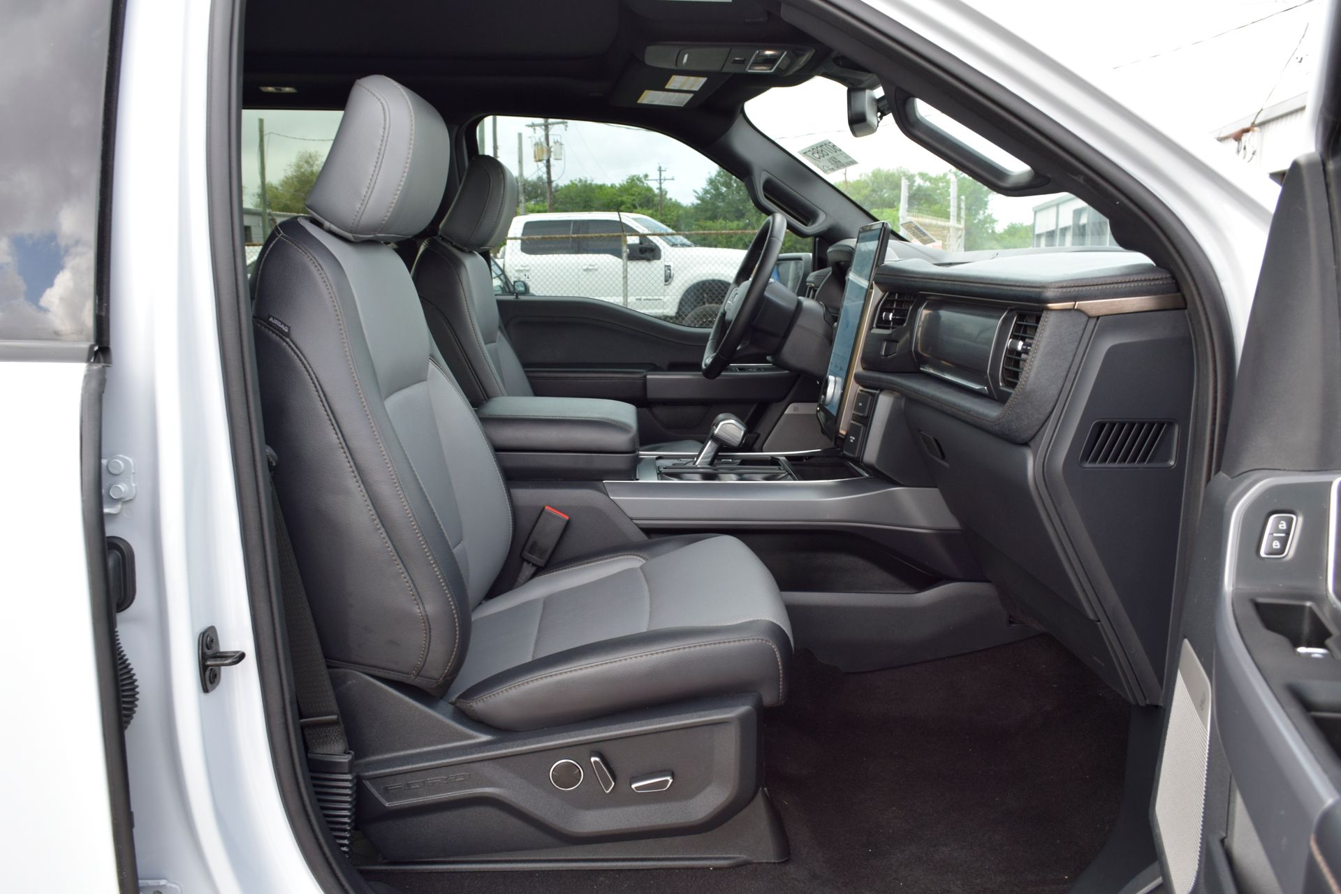2025 Ford F-150 Lightning Lariat White at DeMontrond Ford