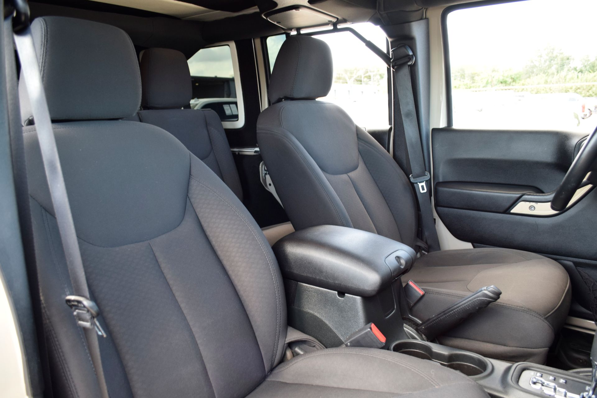 2016 Jeep Wrangler Unlimited Sport Beige at DeMontrond Automotive Group