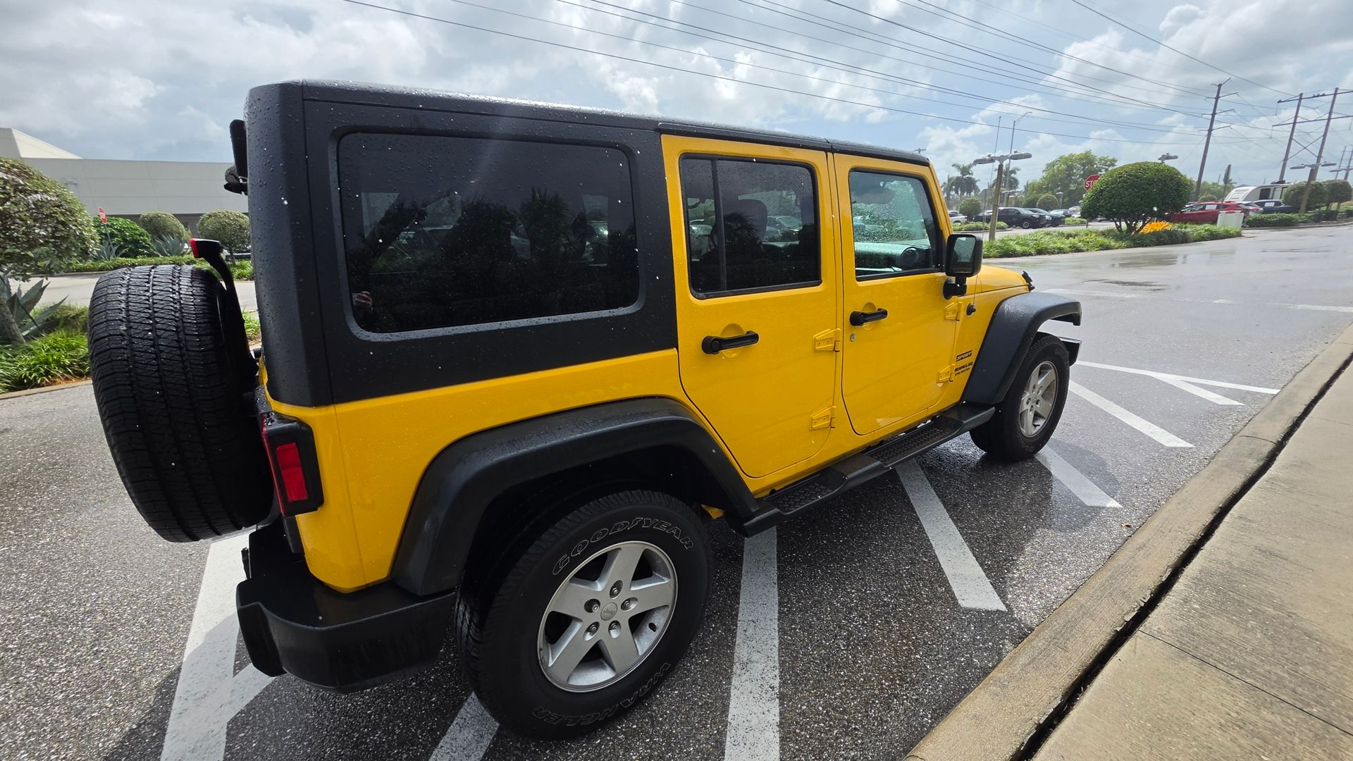 Used 2015 Baja Yellow Clearcoat Jeep Unlimited Sport image 5