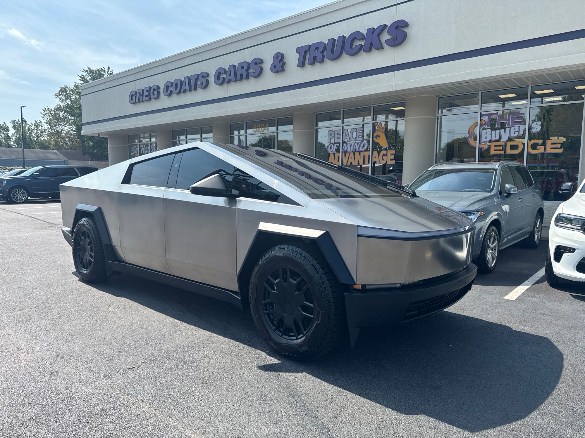 Silver 2024 Tesla Cybertruck Pickup Truck All-Wheel Drive 1-Speed Automatic