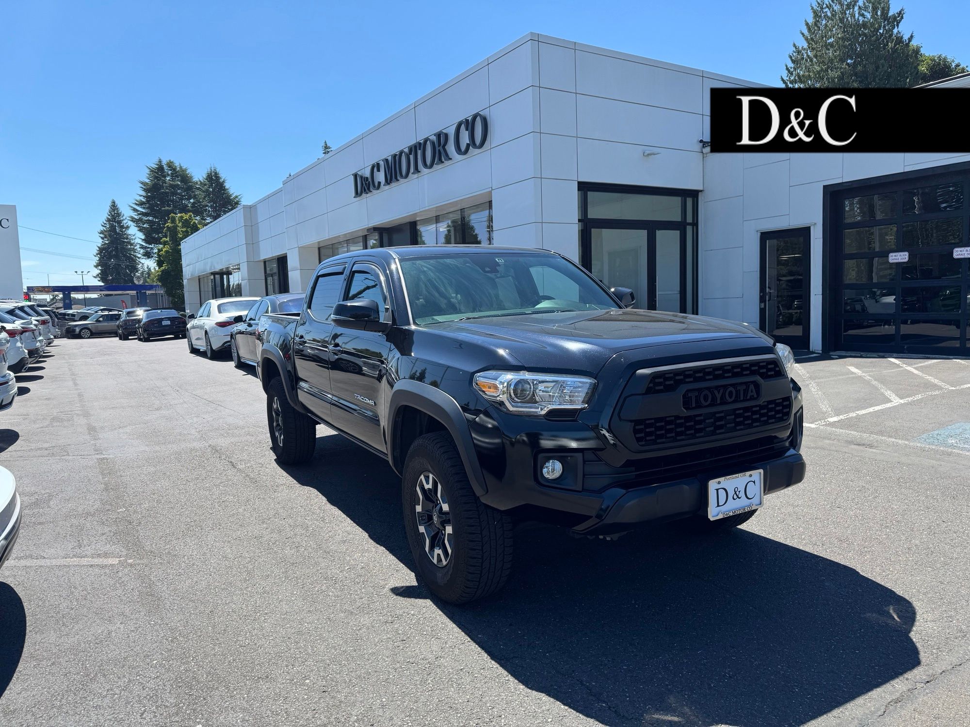 Midnight Black Metallic 2019 Toyota Tacoma Pickup Truck Four-Wheel Drive 6-Speed Automatic