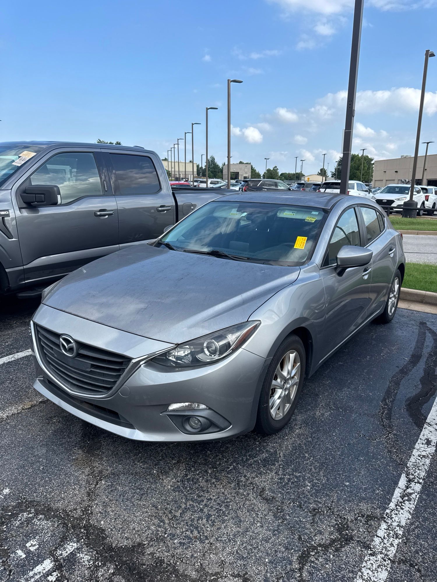 Liquid Silver Metallic 2016 Mazda MAZDA3 Hatchback Front-Wheel Drive 6-Speed Automatic