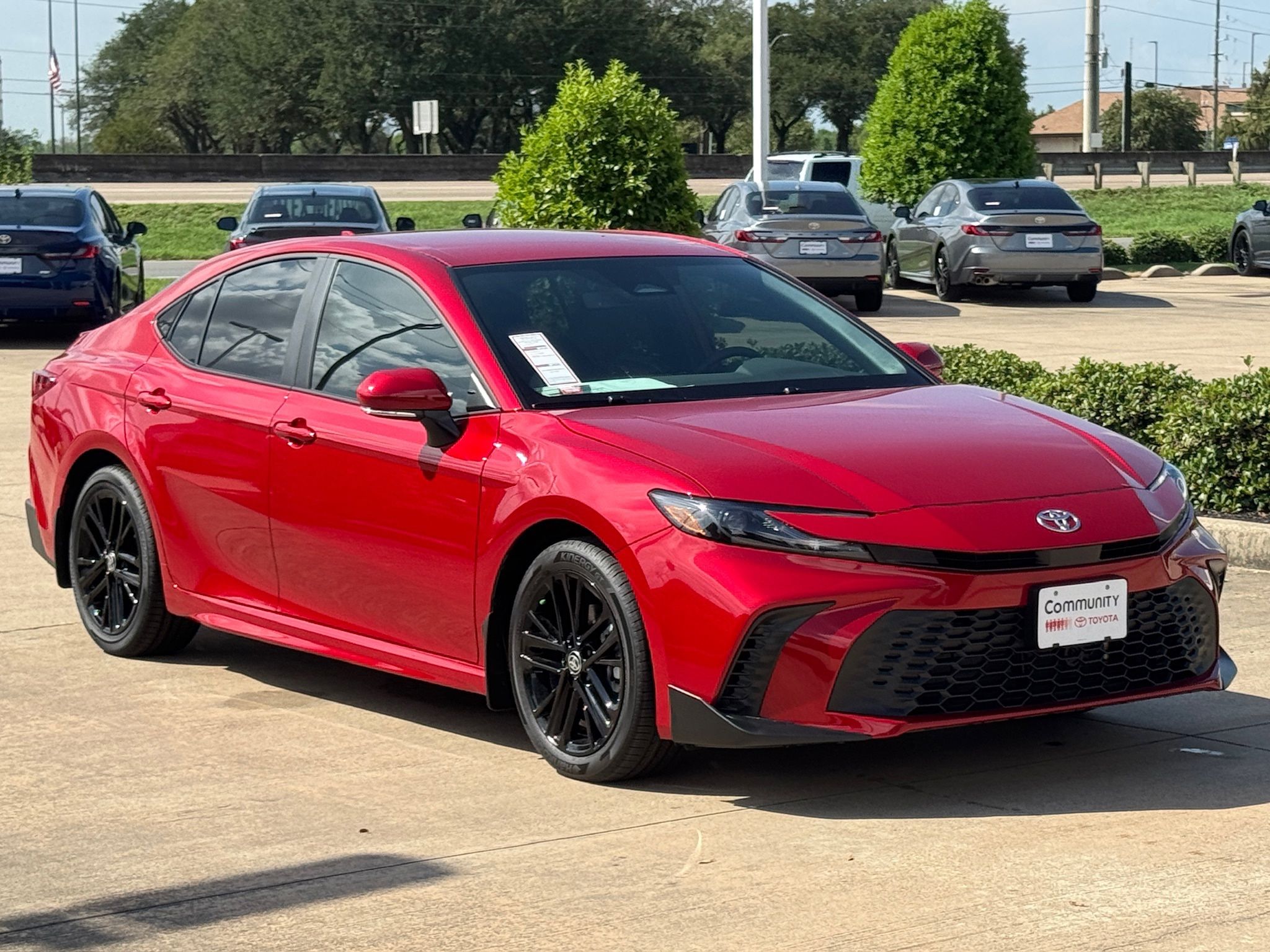 2026 Toyota Camry SE Red at Classic Toyota Galveston