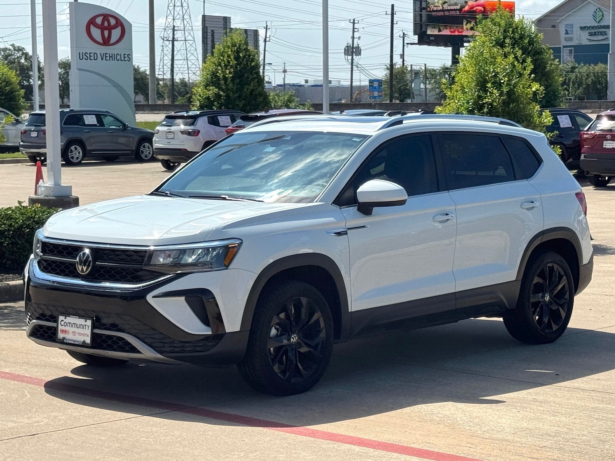 2024 Volkswagen Taos 1.5T SE White at DeMontrond Automotive Group