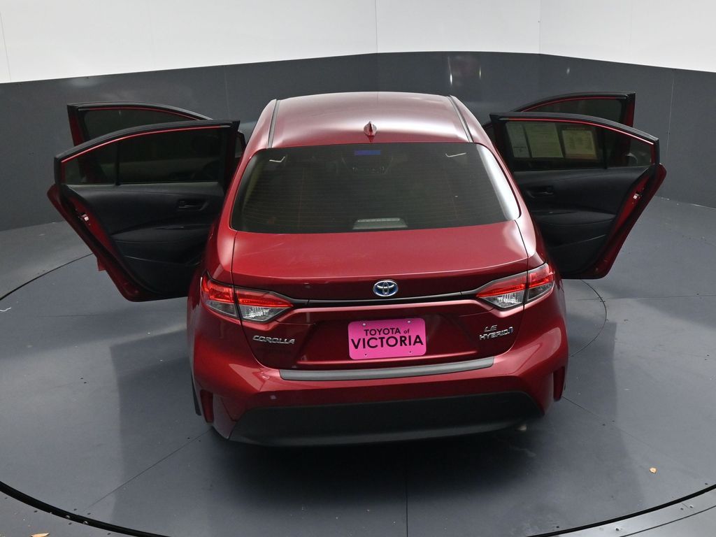 2024 Toyota Corolla Hybrid LE Red at DeMontrond Automotive Group