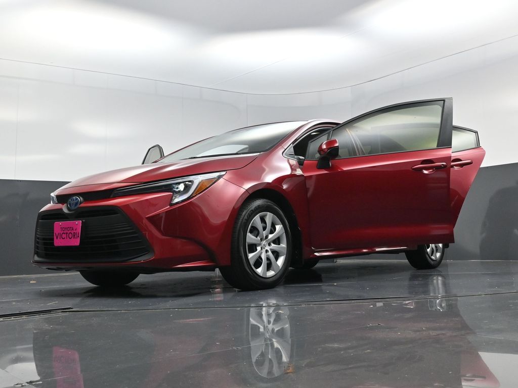 2024 Toyota Corolla Hybrid LE Red at DeMontrond Automotive Group