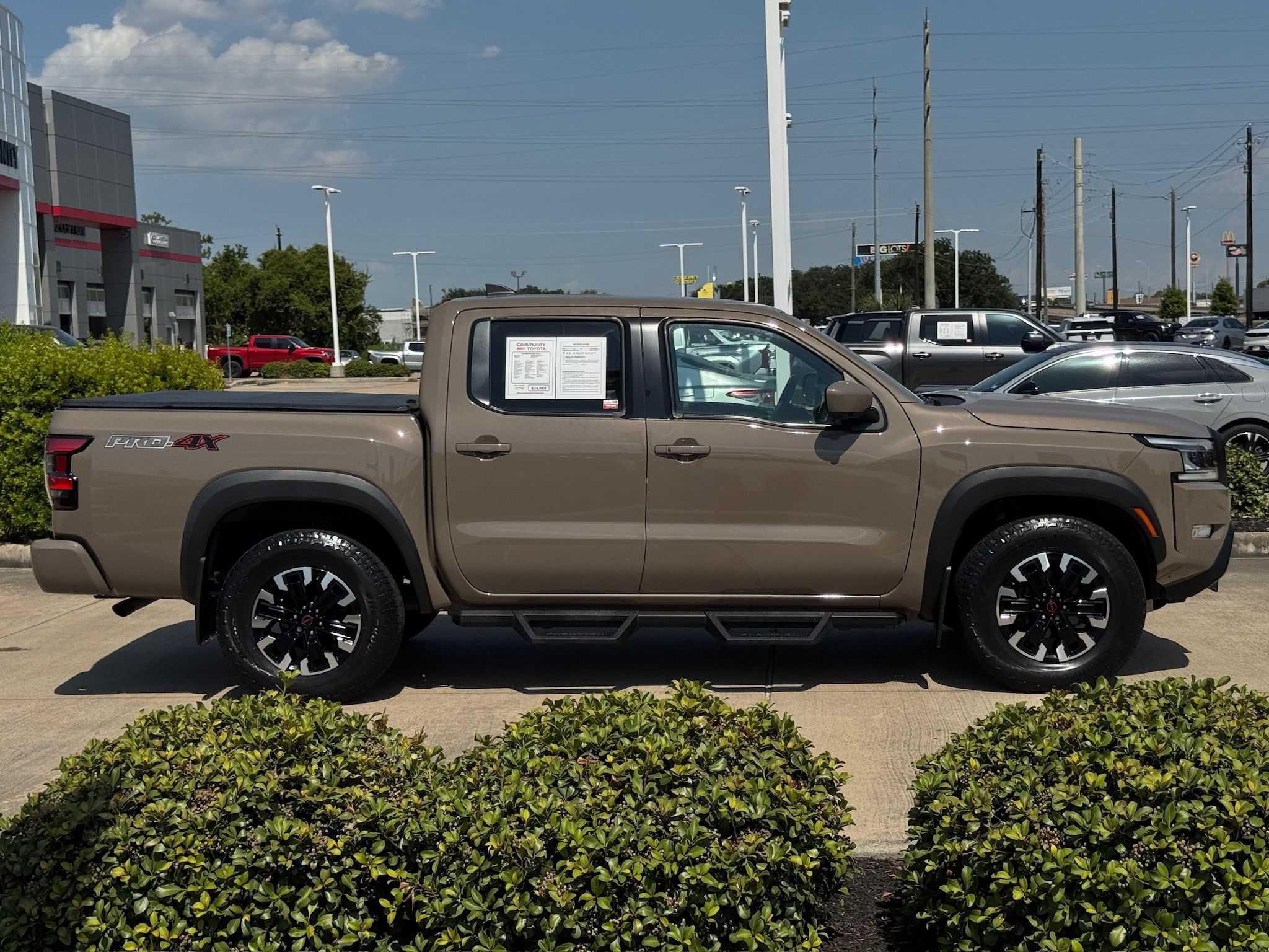 2023 Nissan Frontier PRO-4X Beige at Big Star Buick GMC