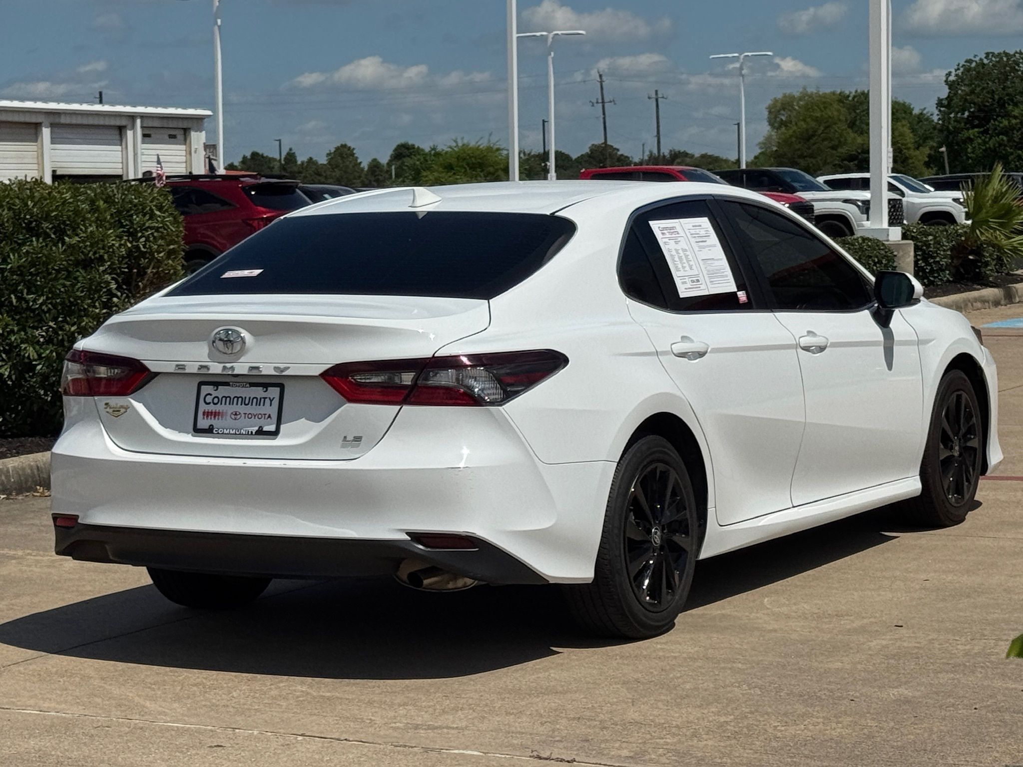 2024 Toyota Camry LE White at Classic Elite Chevrolet Sugar Land