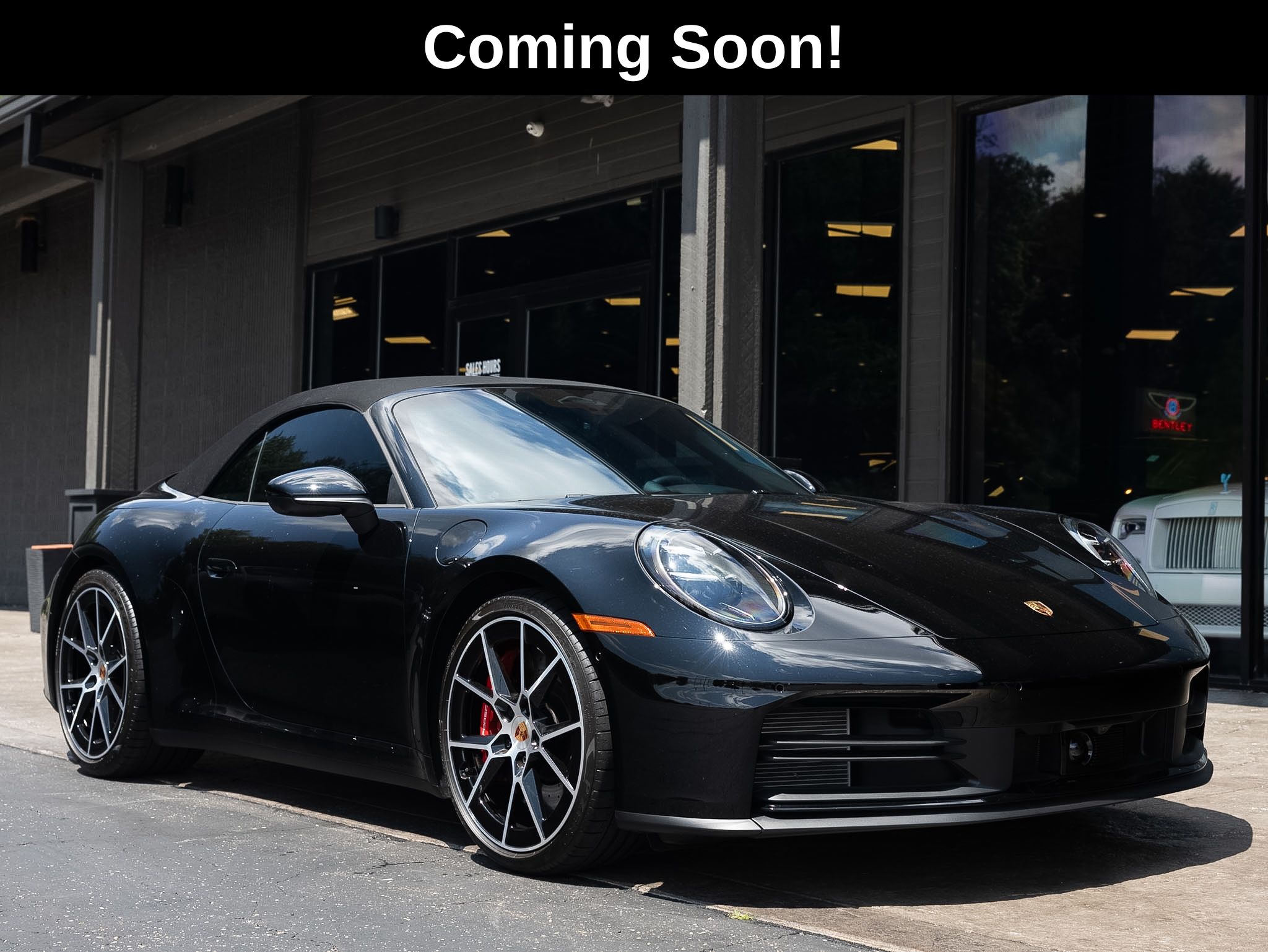 Black 2026 Porsche 911 Convertible All-Wheel Drive 8-Speed Automatic