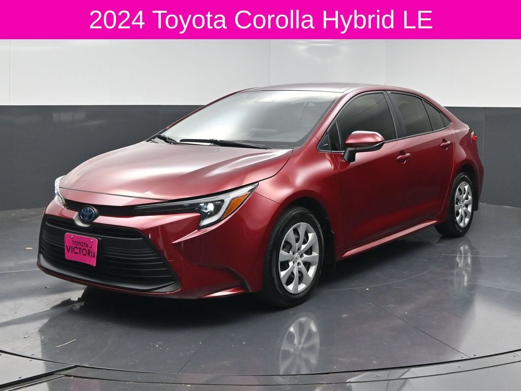 2024 Toyota Corolla Hybrid LE Red at DeMontrond Automotive Group
