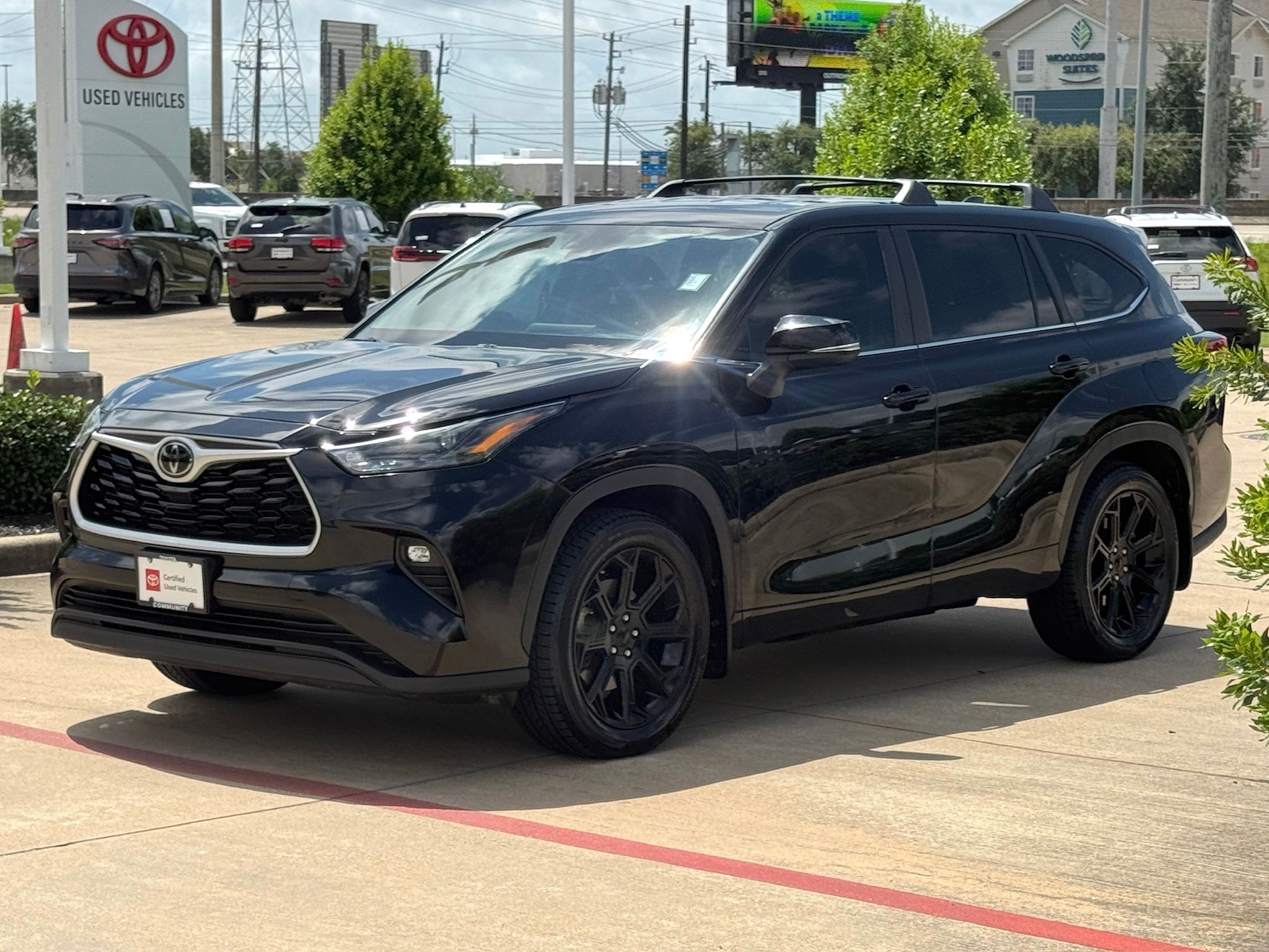 2023 Toyota Highlander LE Black at North Houston Mitsubishi