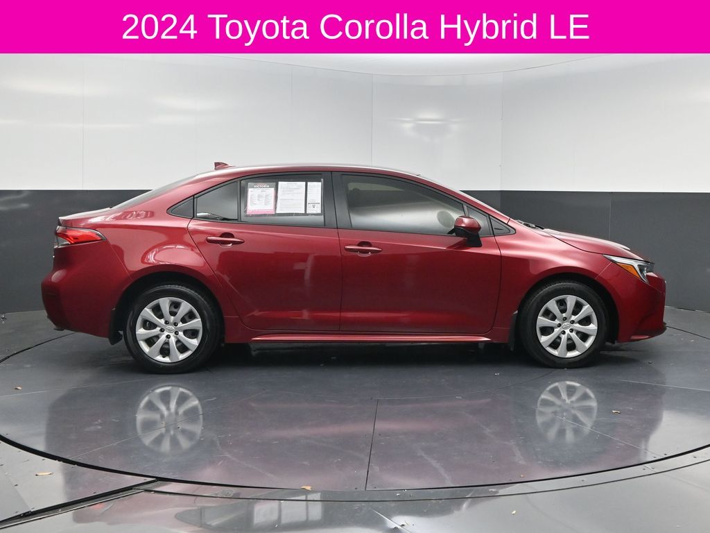 2024 Toyota Corolla Hybrid LE Red at DeMontrond Automotive Group