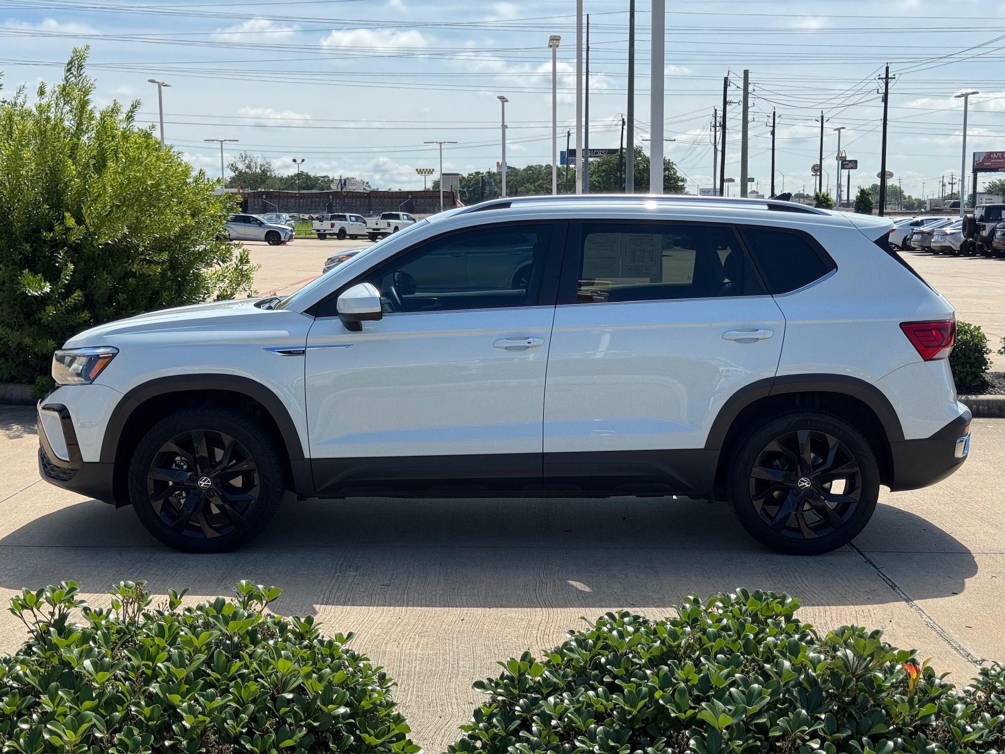 2024 Volkswagen Taos 1.5T SE White at DeMontrond Automotive Group