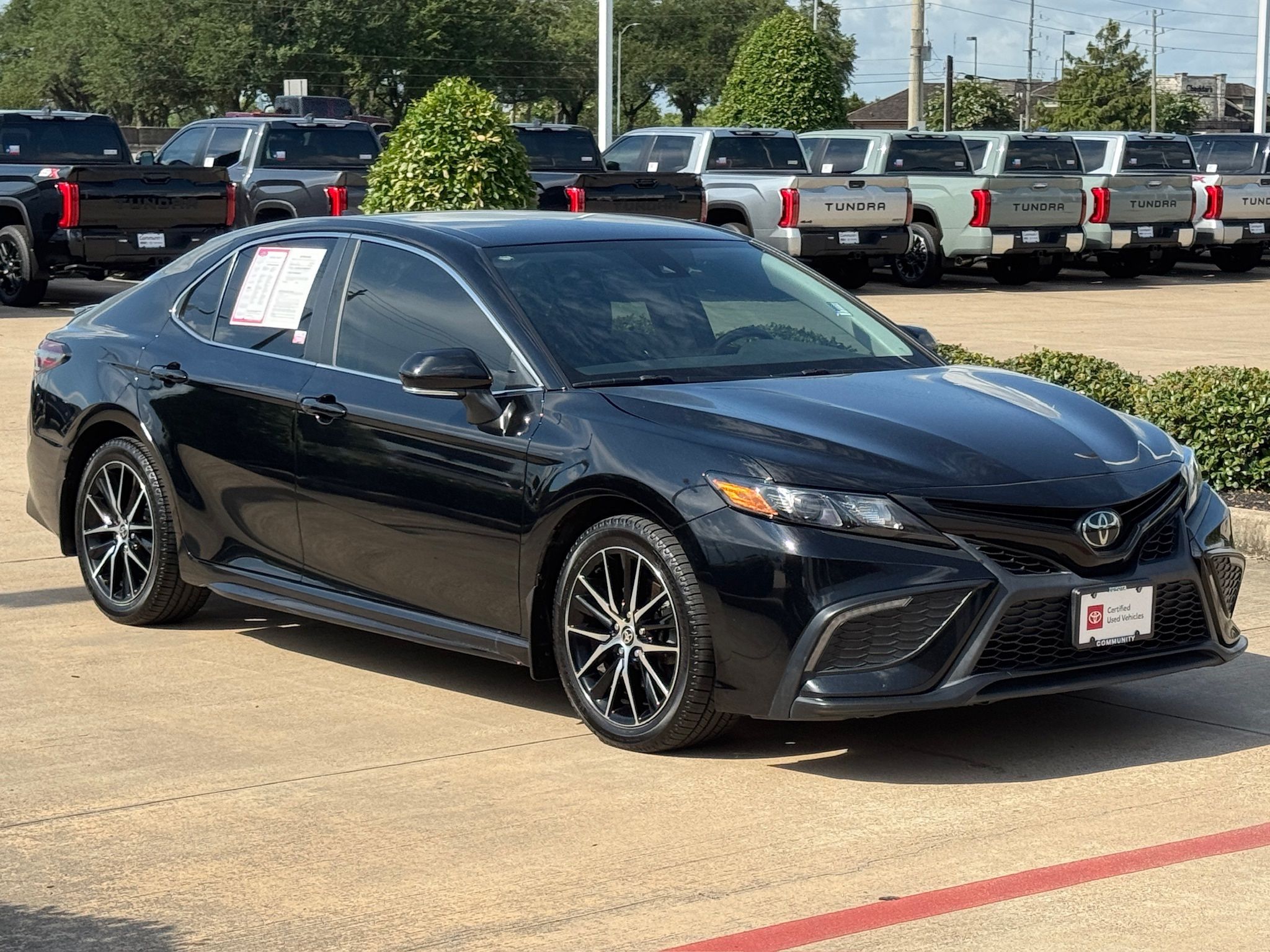 2024 Toyota Camry SE Black at Classic Elite Chevrolet Sugar Land