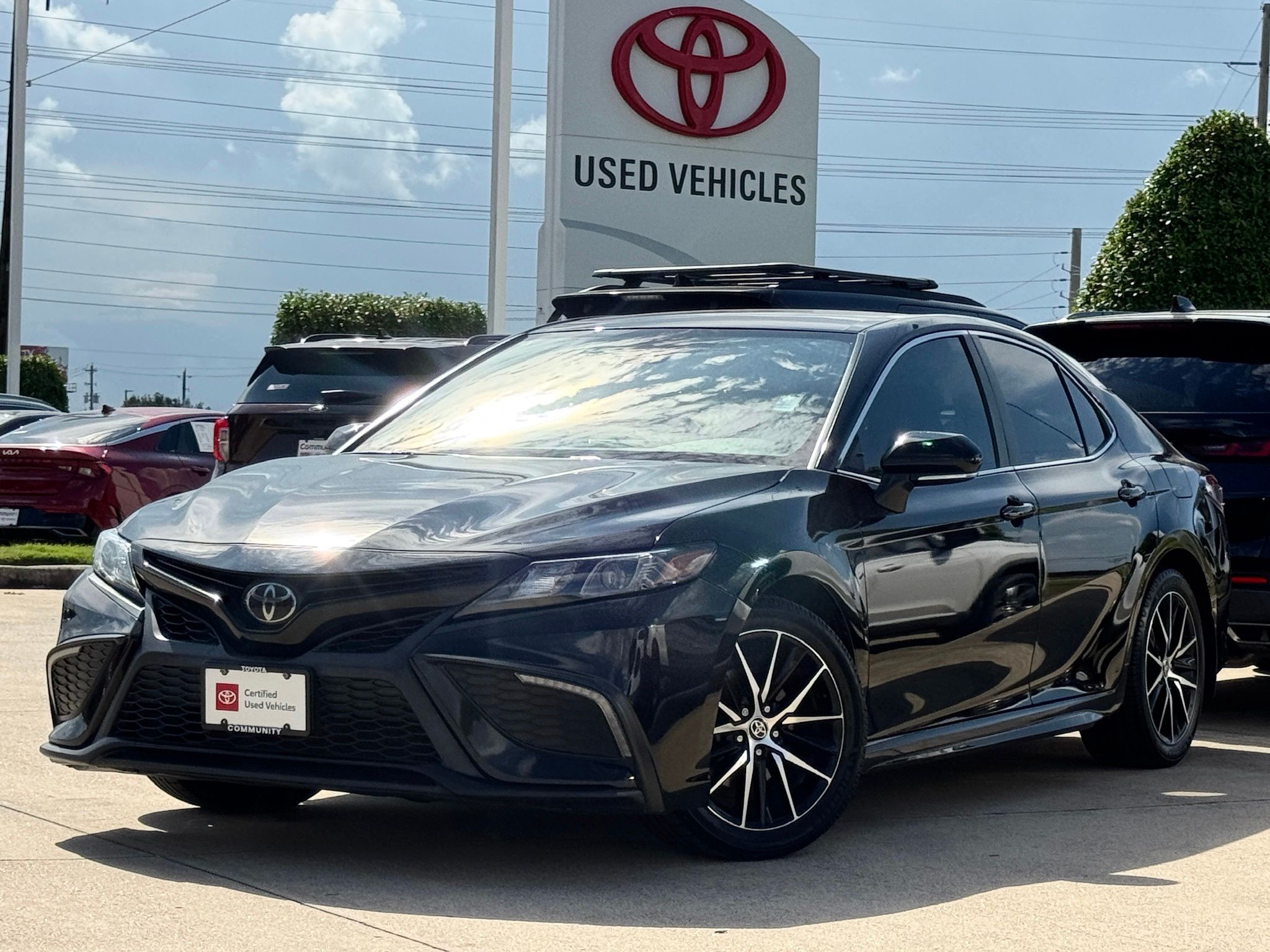 2024 Toyota Camry SE Black at Classic Elite Chevrolet Sugar Land