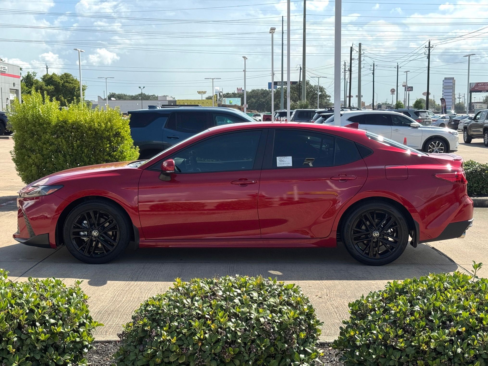 2026 Toyota Camry SE Red at Classic Toyota Galveston