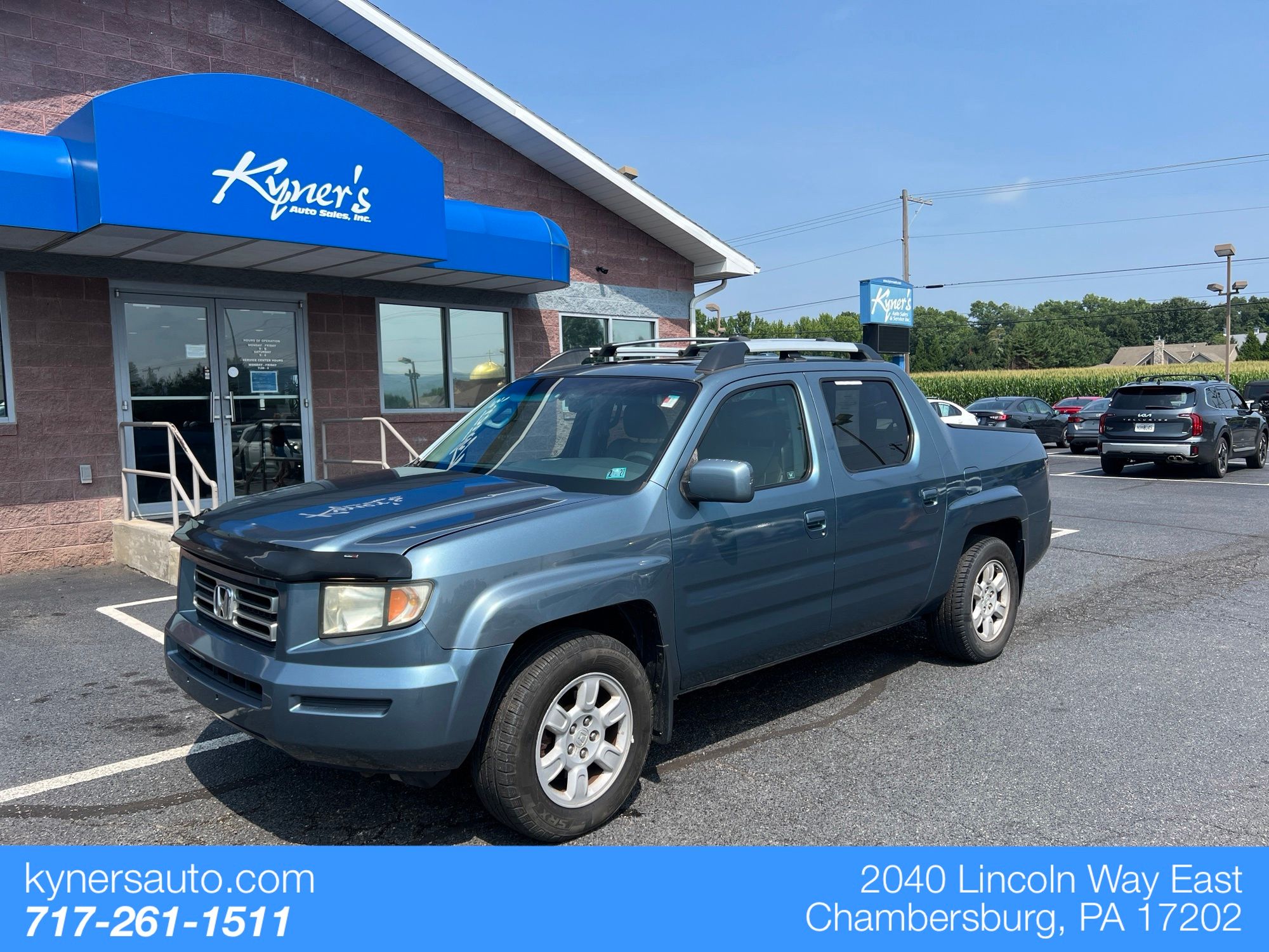 Blue 2006 Honda Ridgeline Pickup Truck All-Wheel Drive 5-Speed Automatic