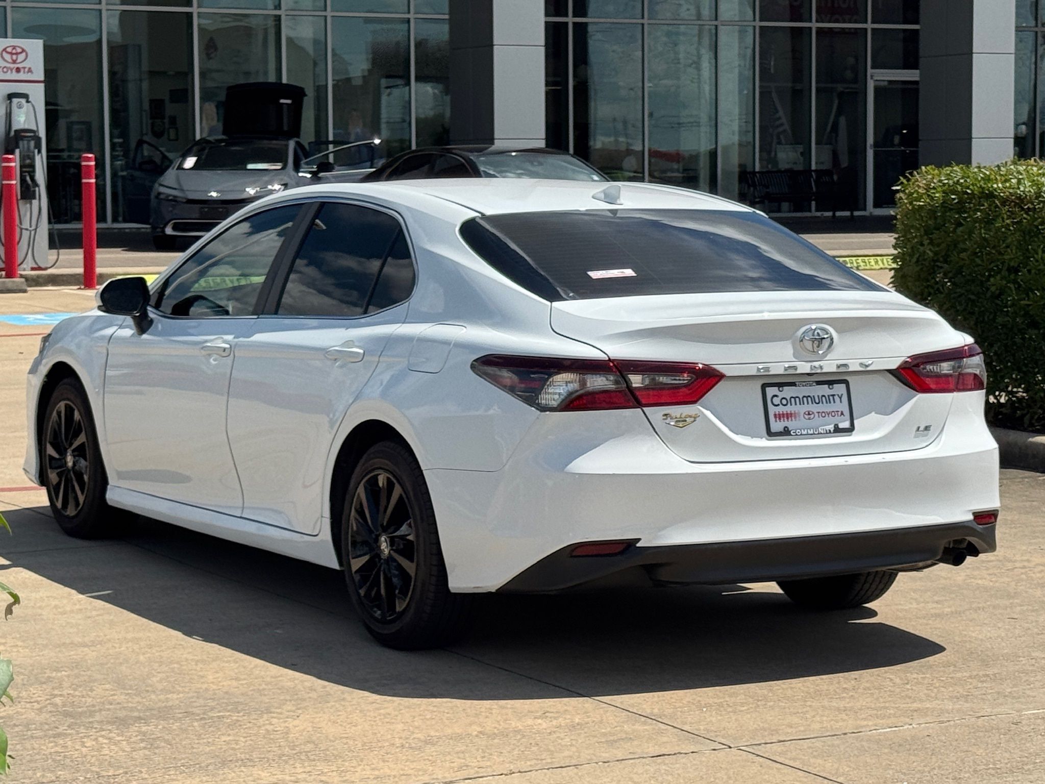 2024 Toyota Camry LE White at Classic Elite Chevrolet Sugar Land