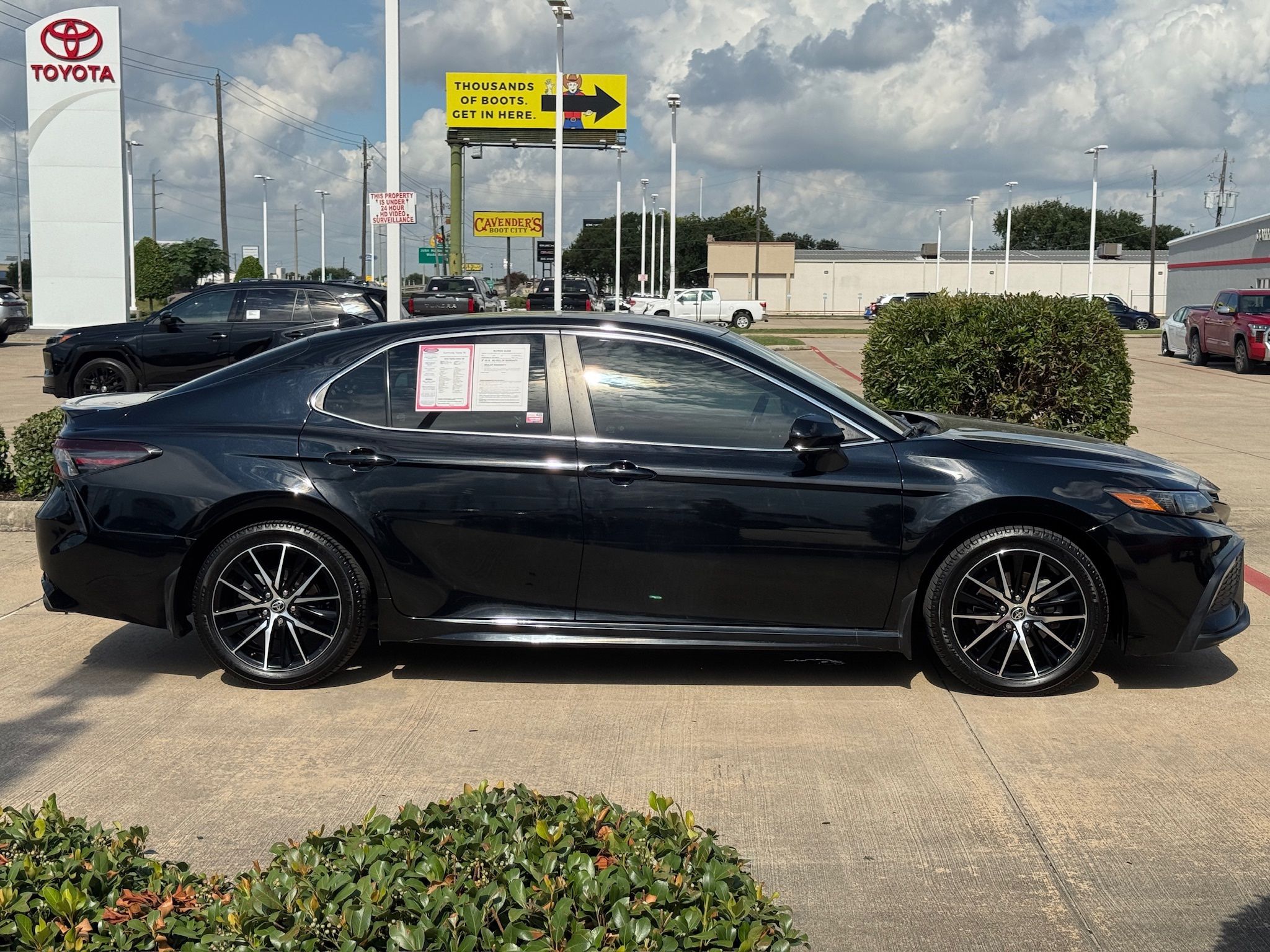 2024 Toyota Camry SE Black at Classic Elite Chevrolet Sugar Land