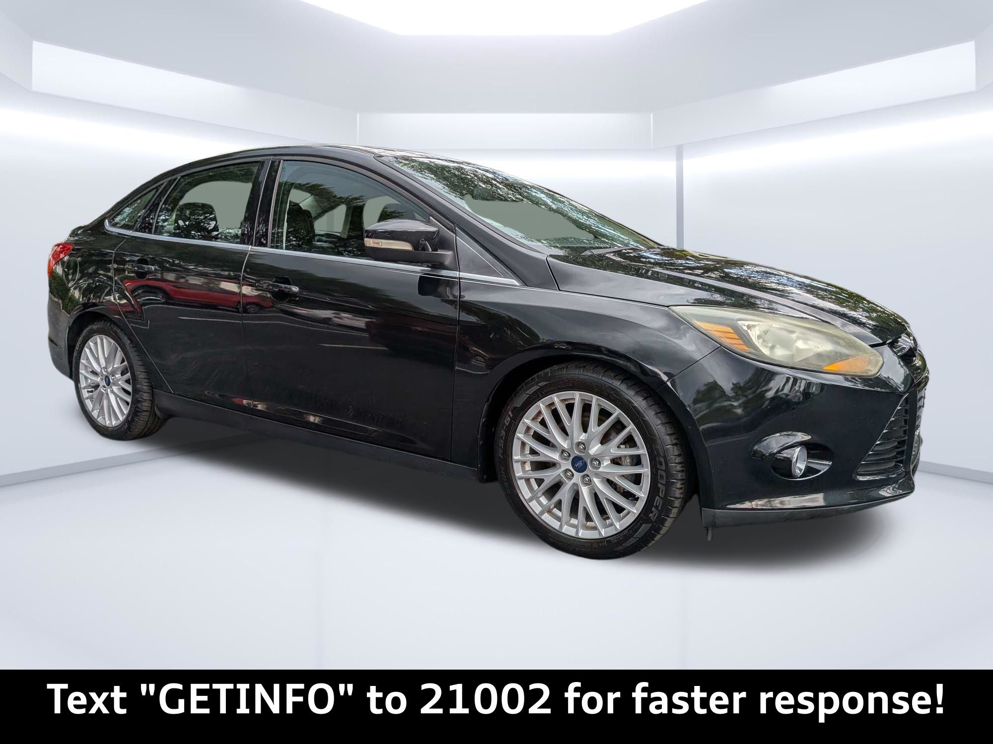 Tuxedo Black Metallic 2014 Ford Focus Sedan Front-Wheel Drive 6-Speed Automatic