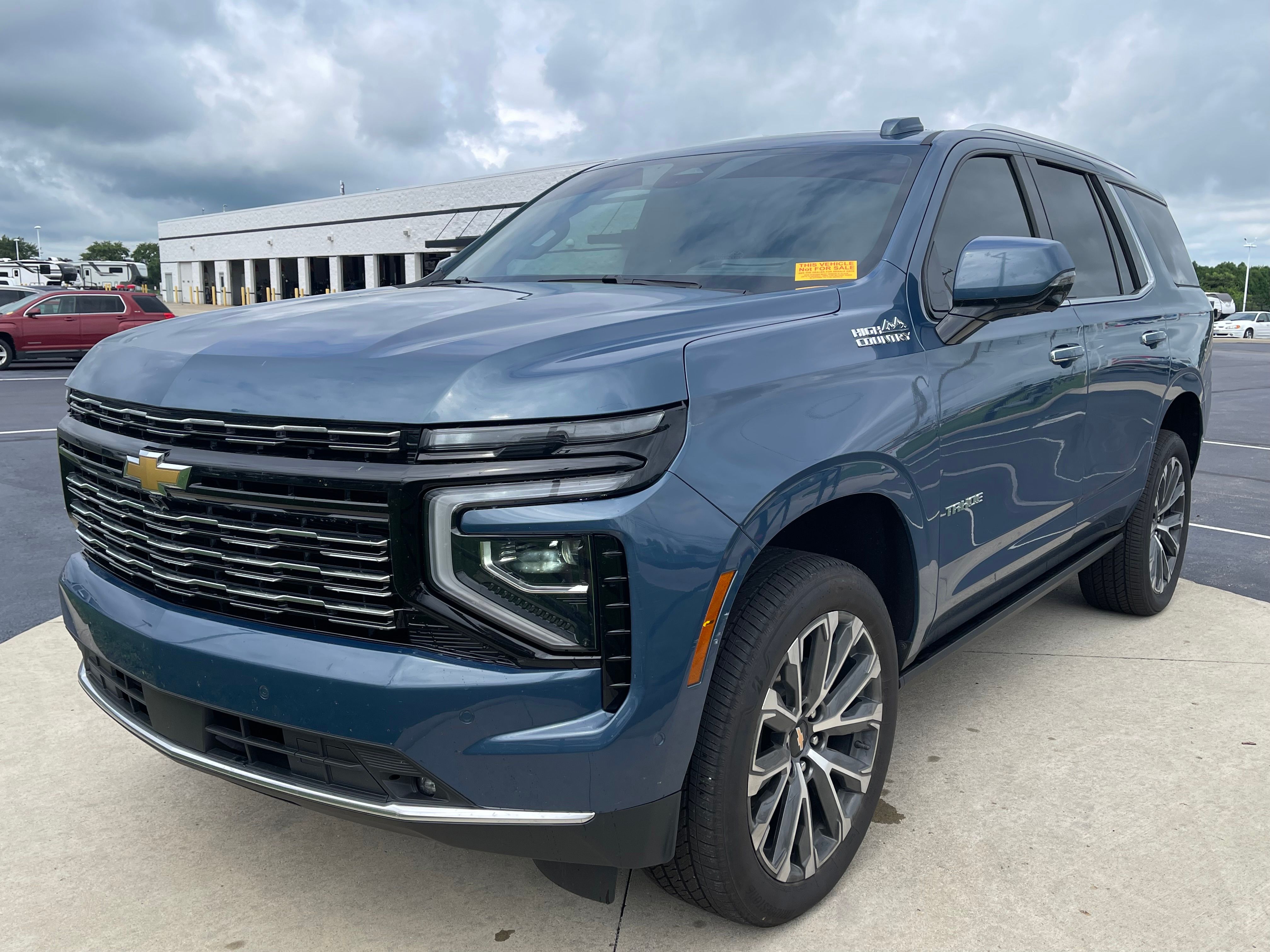Used 2025 Lakeshore Blue Metallic Chevrolet High Country image 3