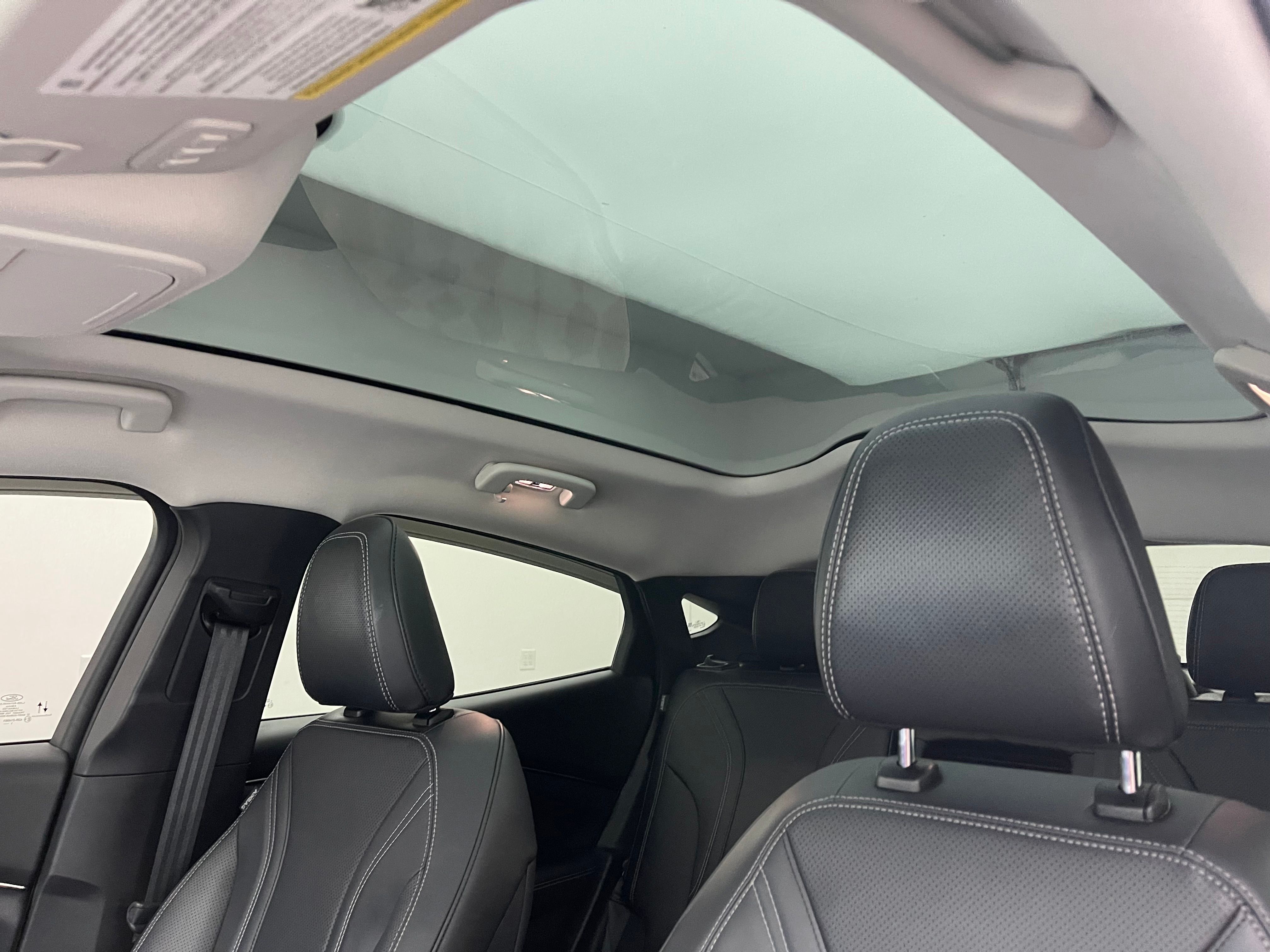 Used 2021 White Metallic Ford Premium image 5