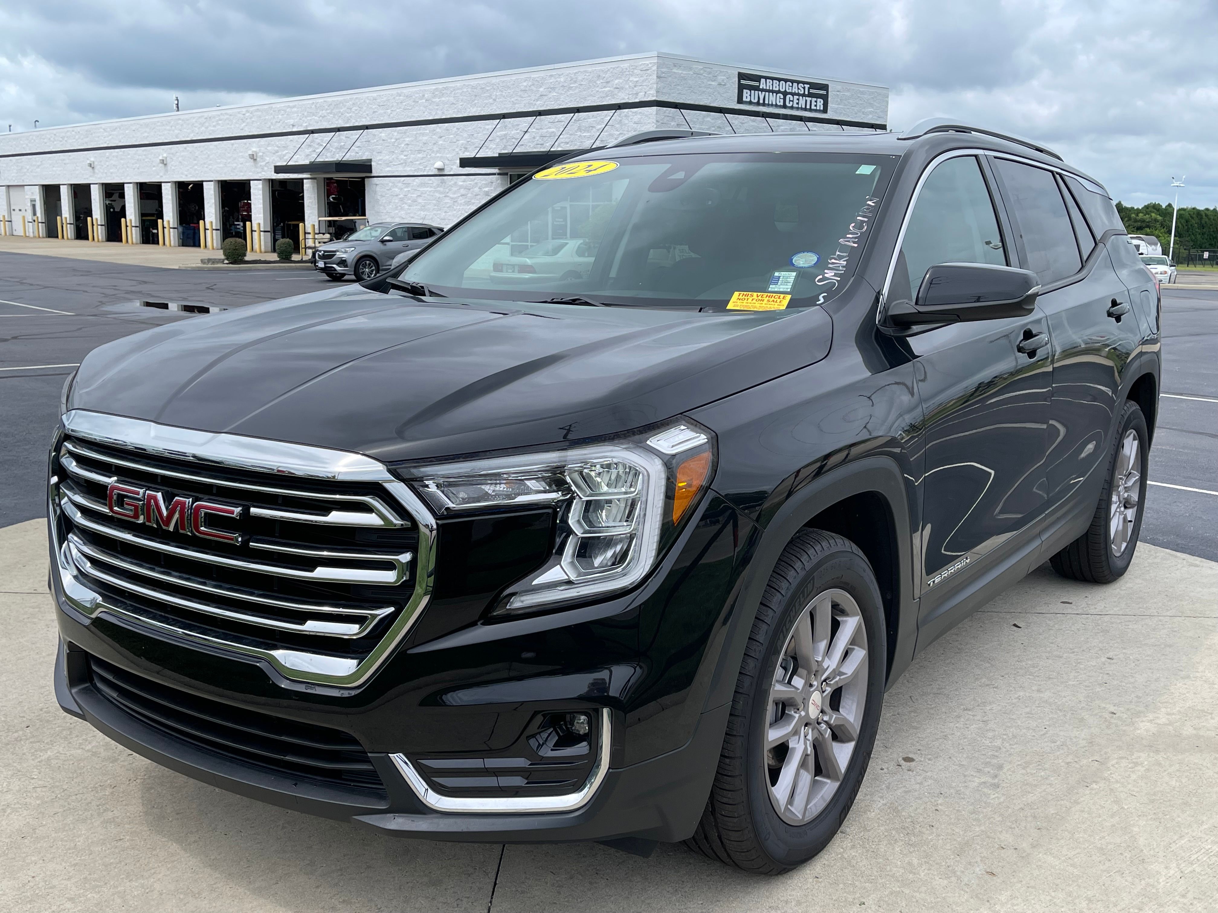 Used 2024 Ebony Twilight Metallic GMC SLT image 3