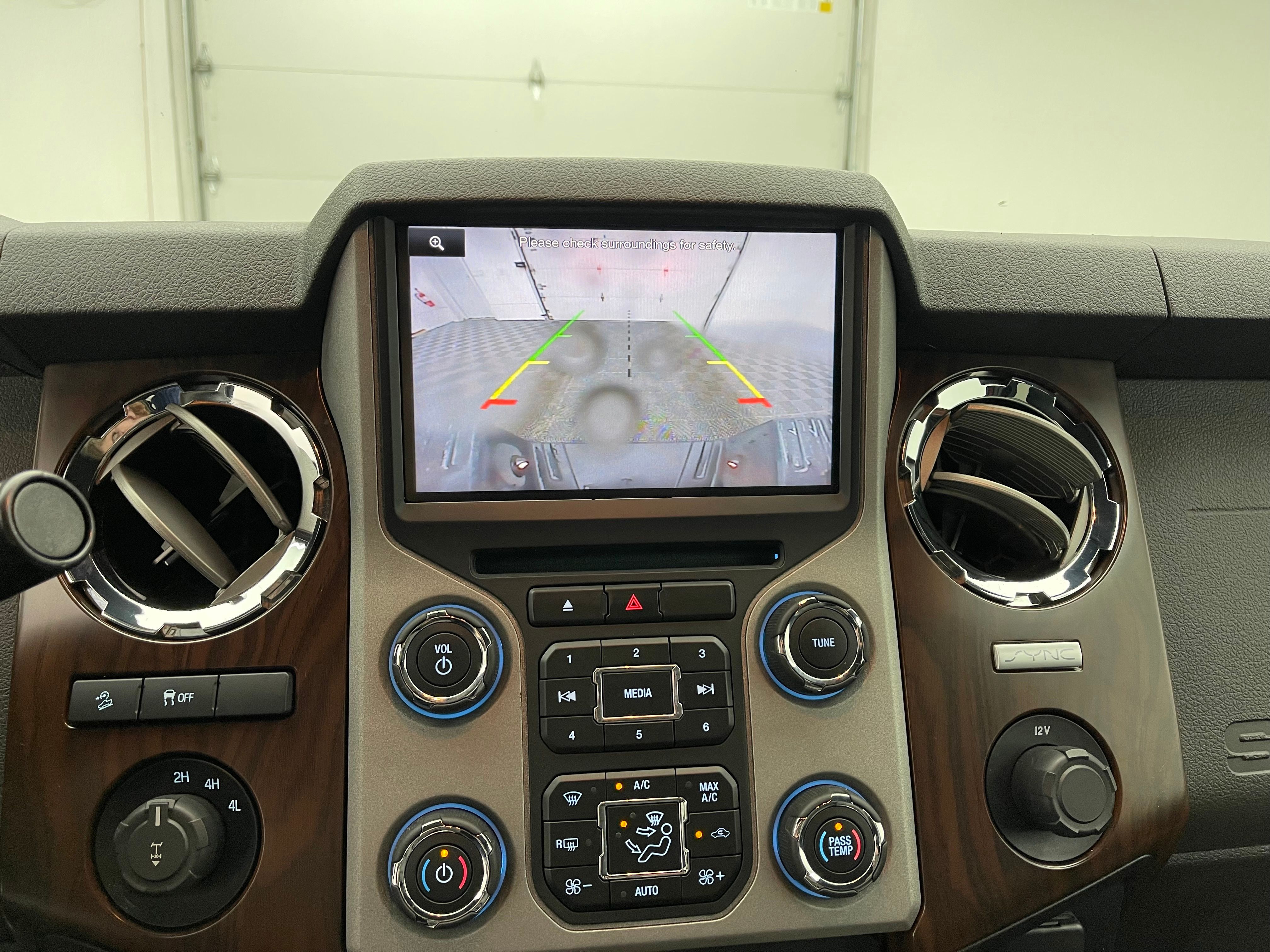 Used 2015 Ruby Red Metallic Ford Lariat image 4