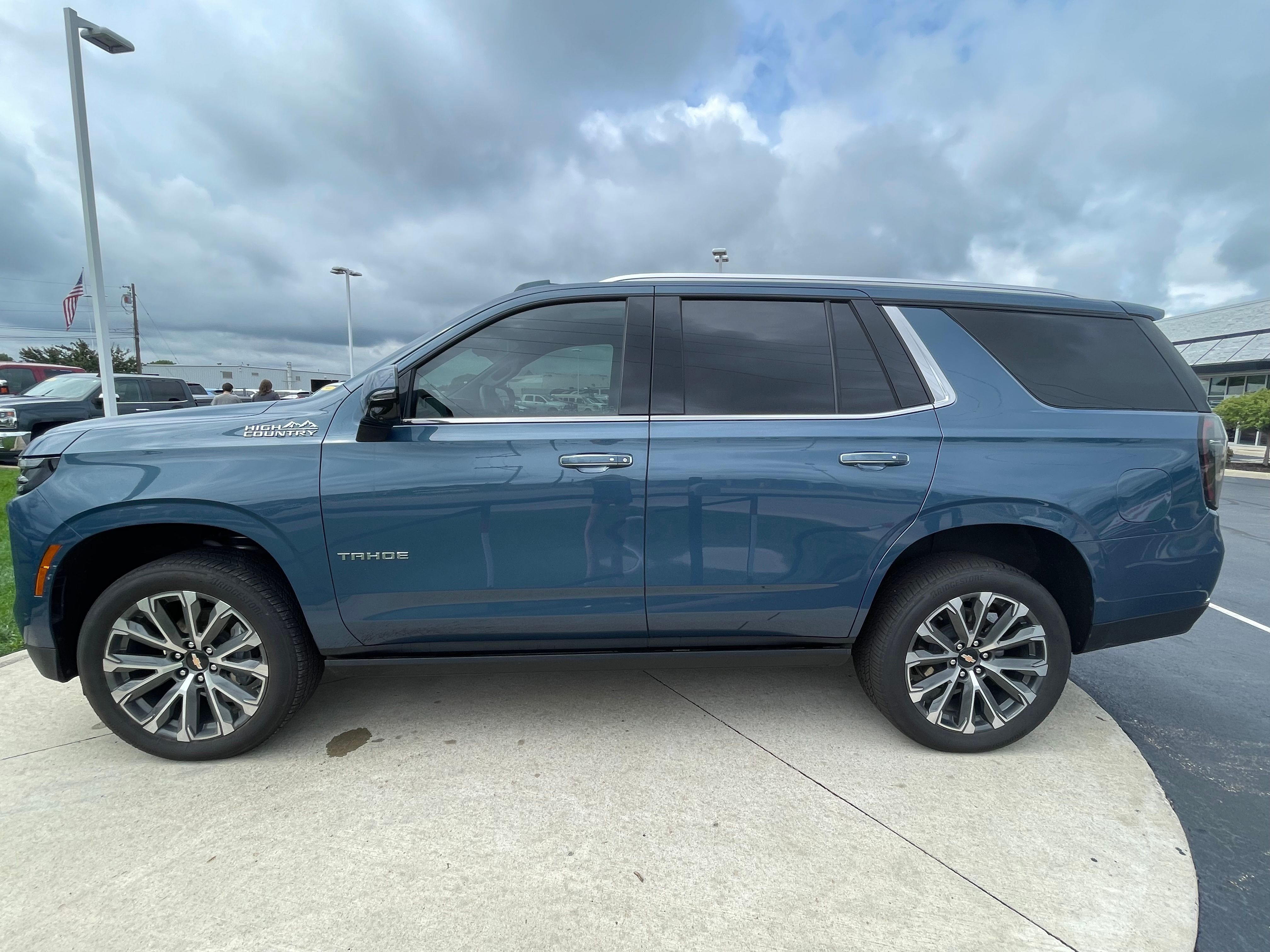 Used 2025 Lakeshore Blue Metallic Chevrolet High Country image 4