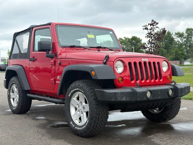 Flame Red 2009 Jeep Wrangler SUV / Crossover Four-Wheel Drive 4-Speed Automatic