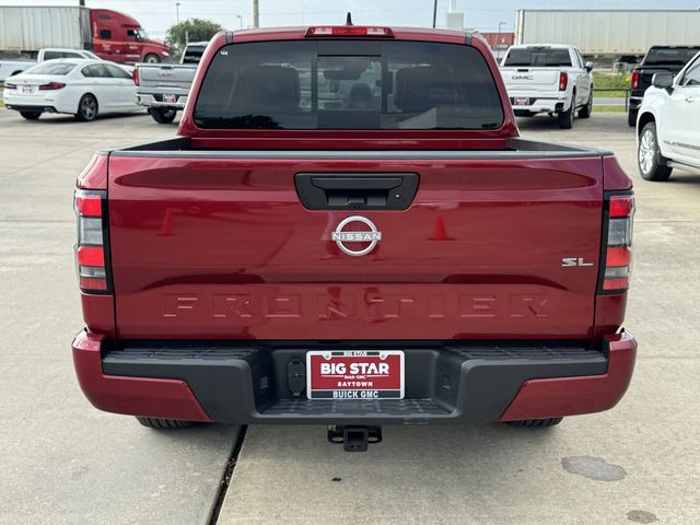 2024 Nissan Frontier SL Red at DeMontrond Auto Country