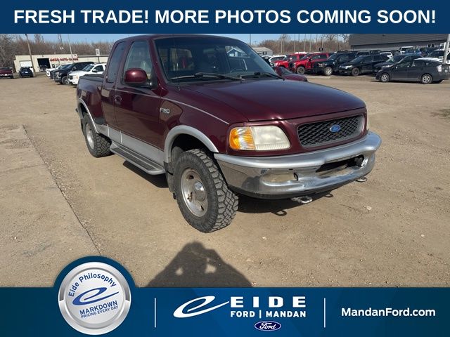 Red (Maroon) 1997 Ford F-150 Lariat 4WD Extended Cab Stepside SB Pickup Truck Four-Wheel Drive 5-Speed Manual Overdrive